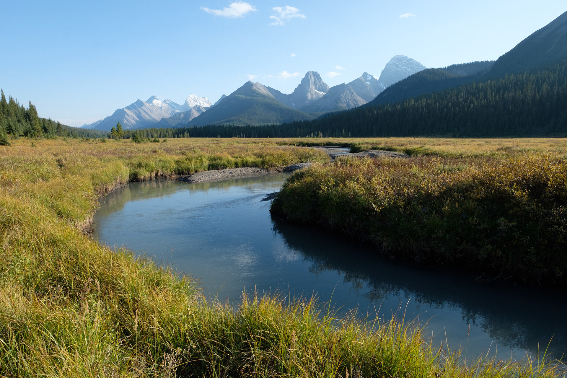 River and meadow in front of Mt Engadine Lodge