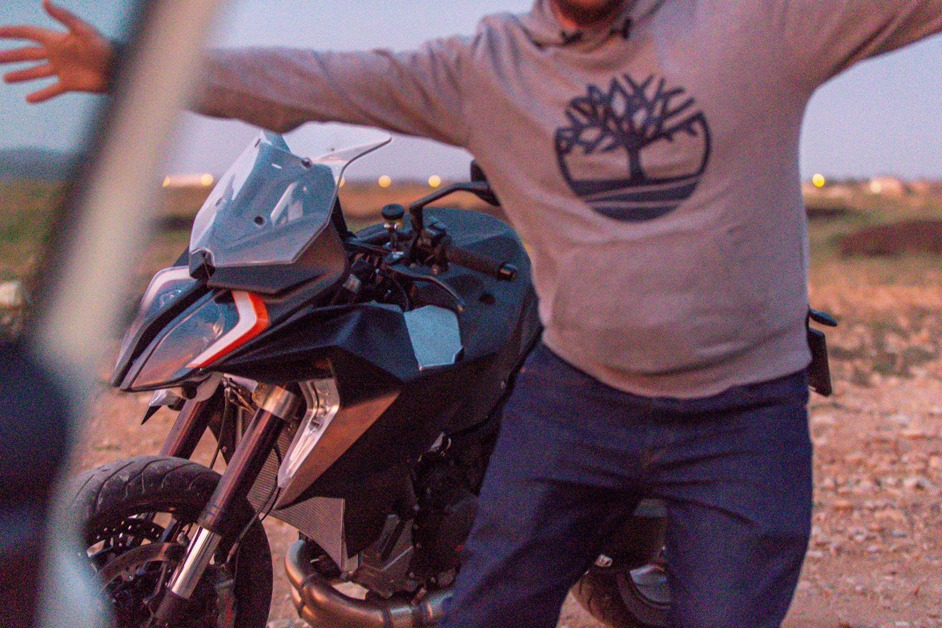 A KTM-engineer trying to protect a prototype of the next 1290 Super Duke GT after test drive during sundown somewhere in Spain.