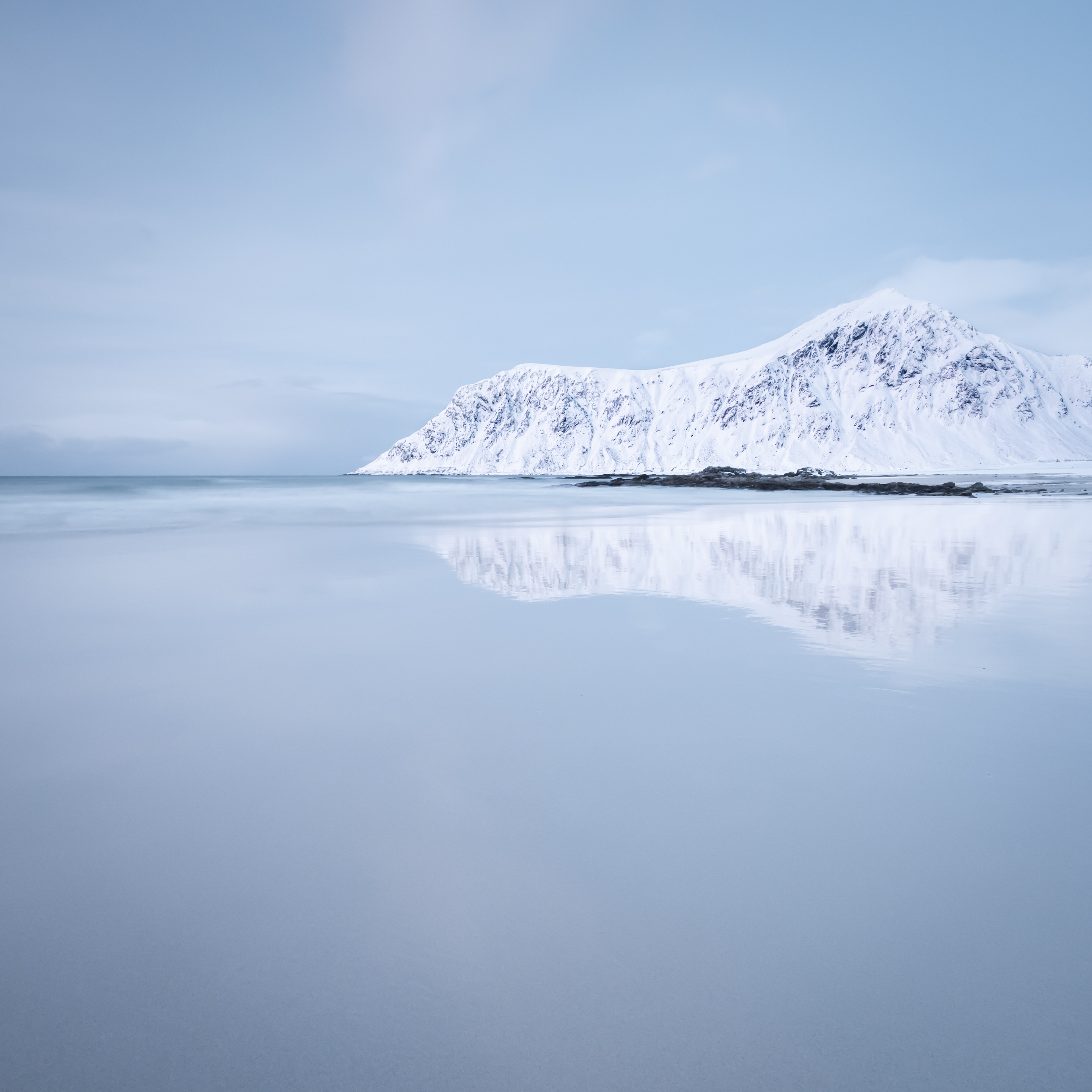 "The day was cold, and every time the little transparent fans of water swept in and drew back, the wet sand mirrored a clear sky and the sun on its way down."  Gina Berriault