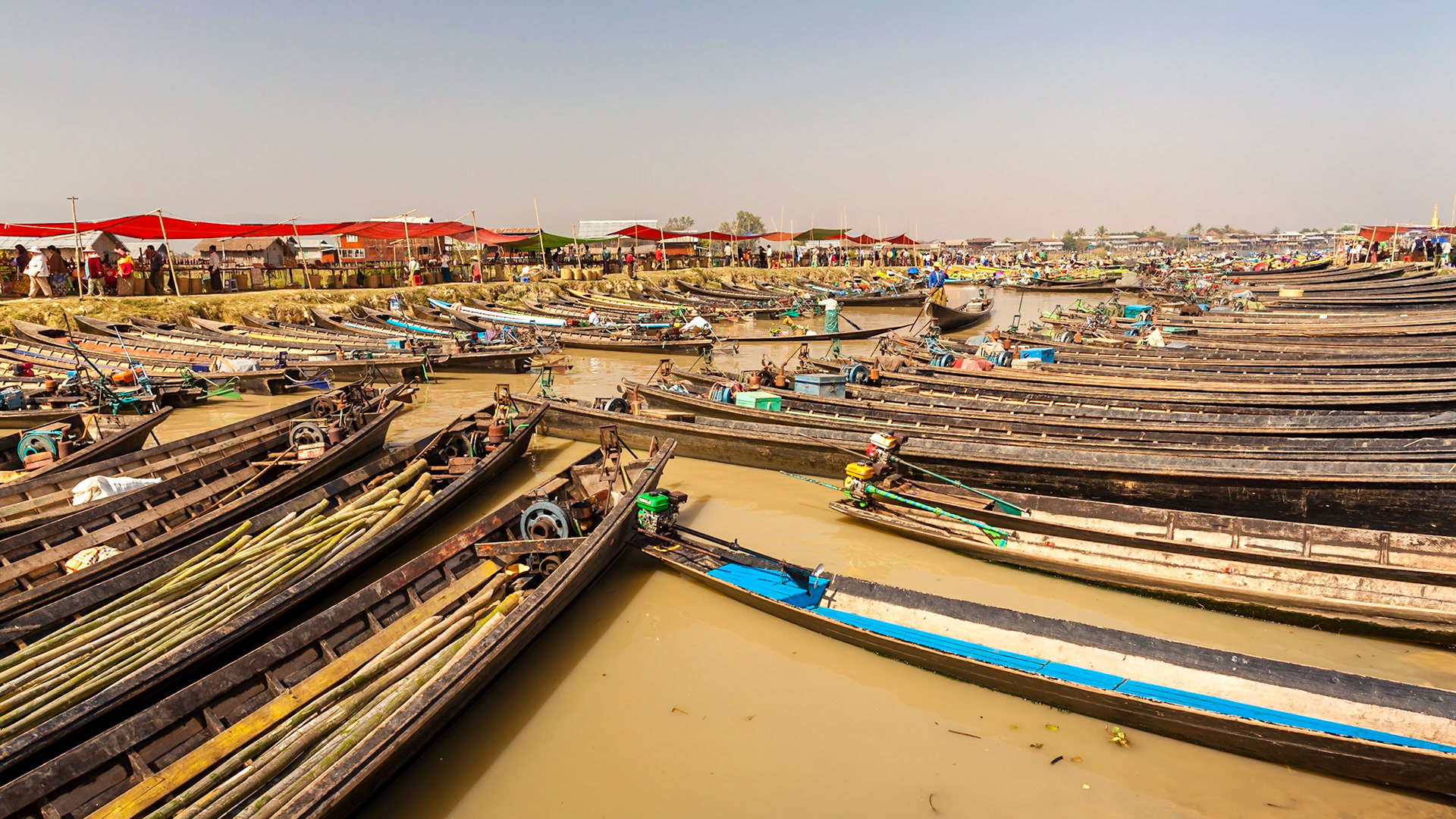 Longboats deliver produce to market, Nampan