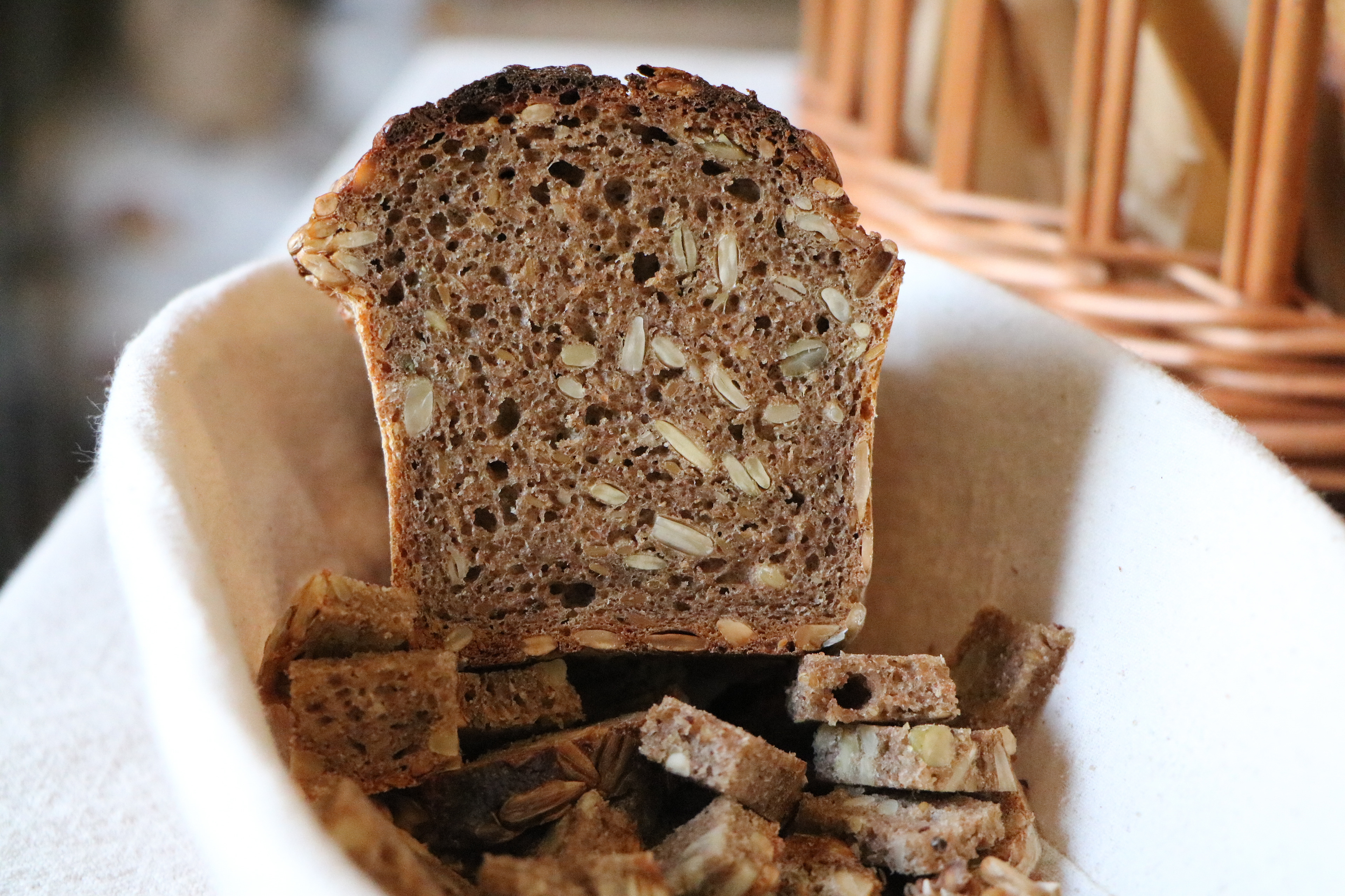 A basket of a Rye loaf for customers to taste at Gusto Bread.