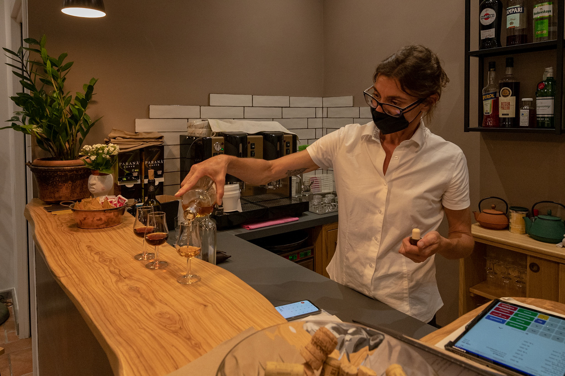 Restaurant opened, Anna Maria offers amaro to customers