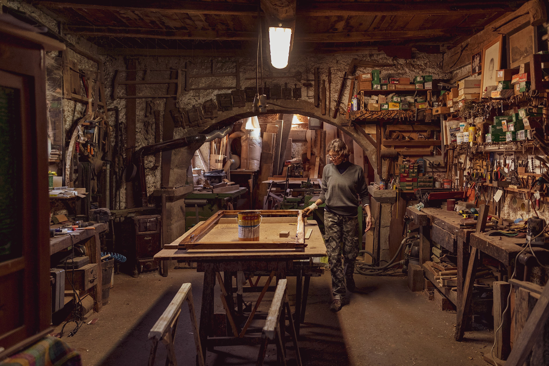 Despite the pandemic doom and gloom, Anna Maria mends a window as she works to reopen a local restaurant