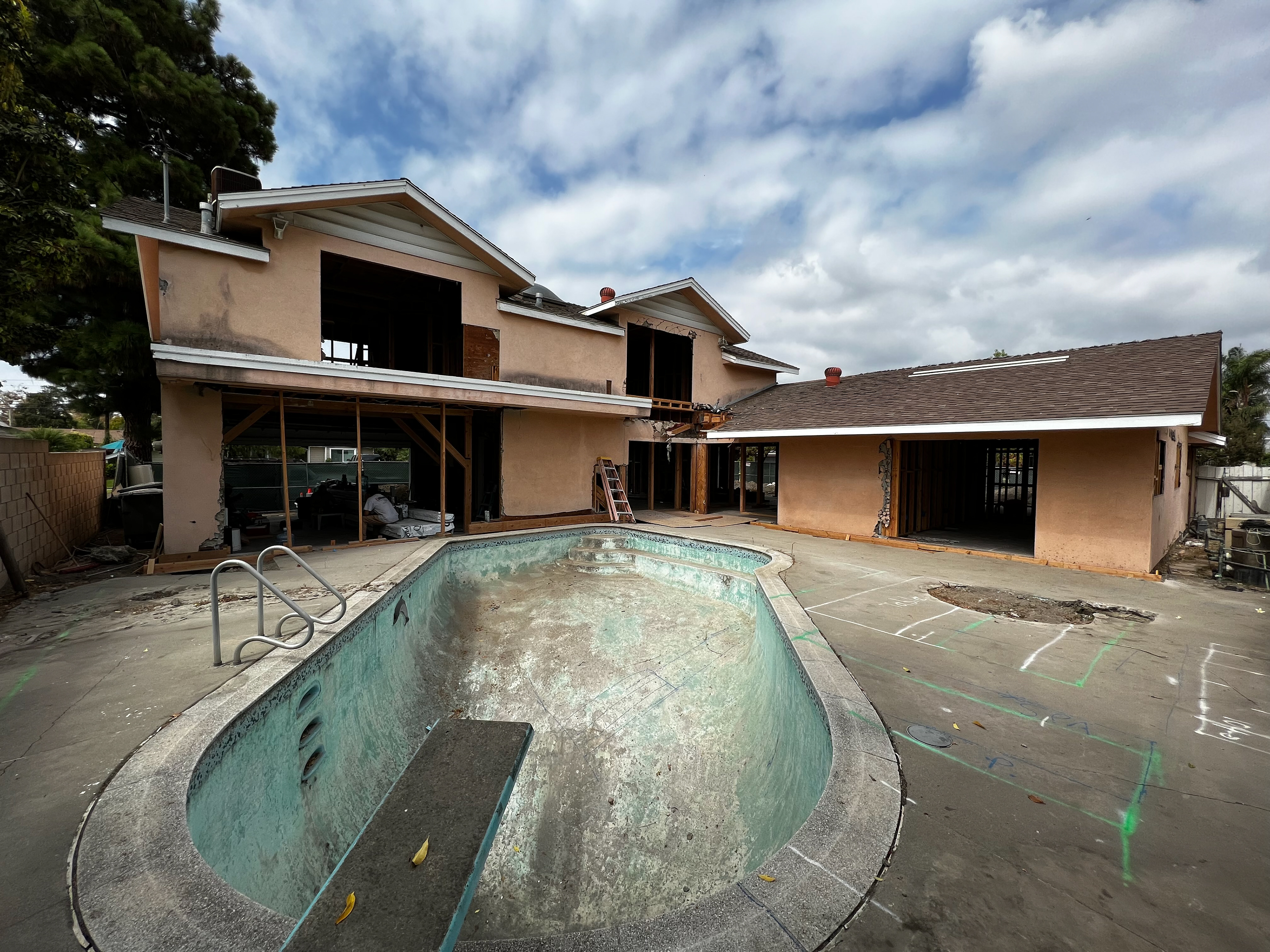 The support post in the center opening was removed and the pool was realigned to be parallel with the home lines.