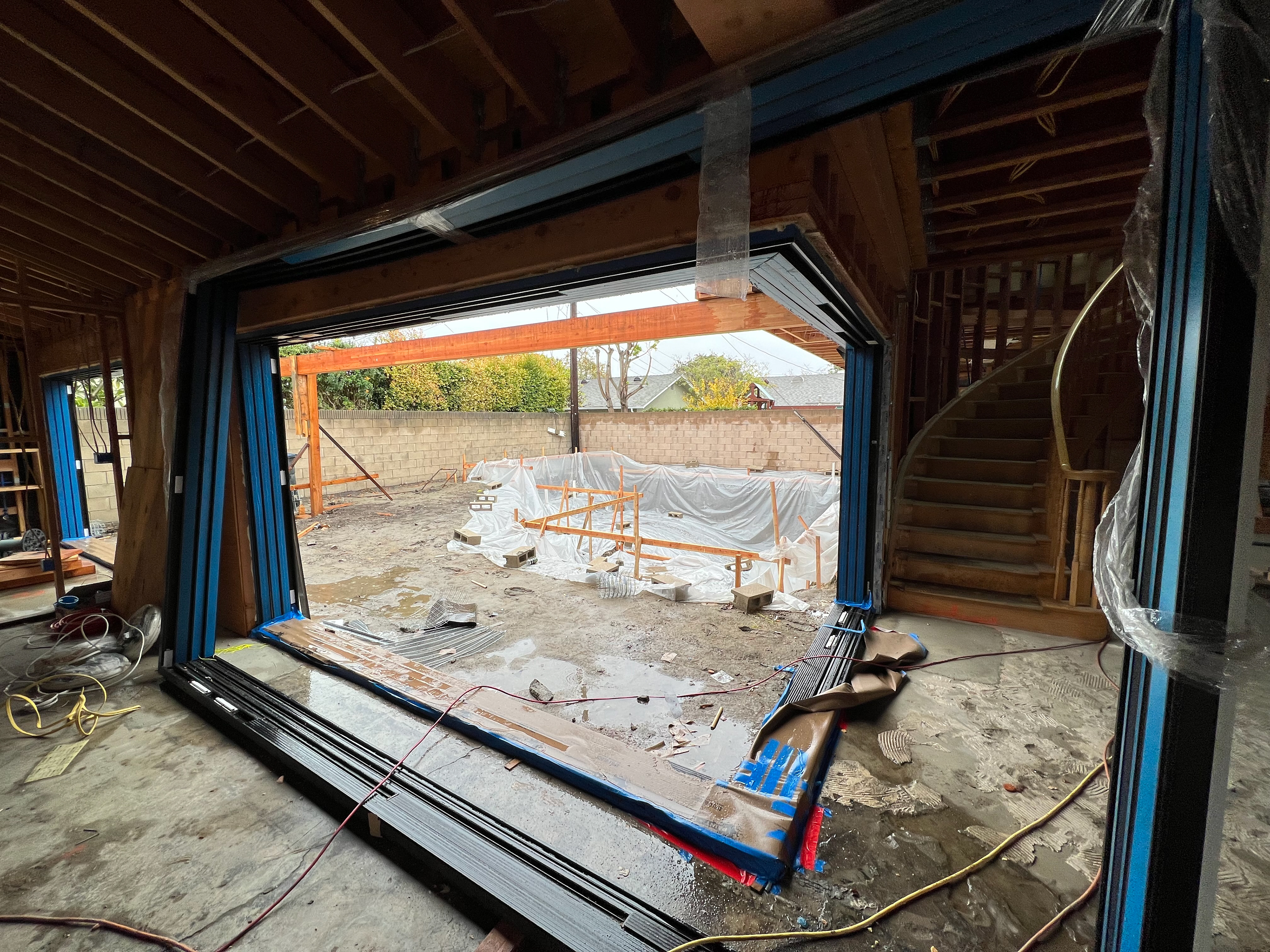 The home was engineered so that a major support post could be removed that was obstructing the view into the back yard.