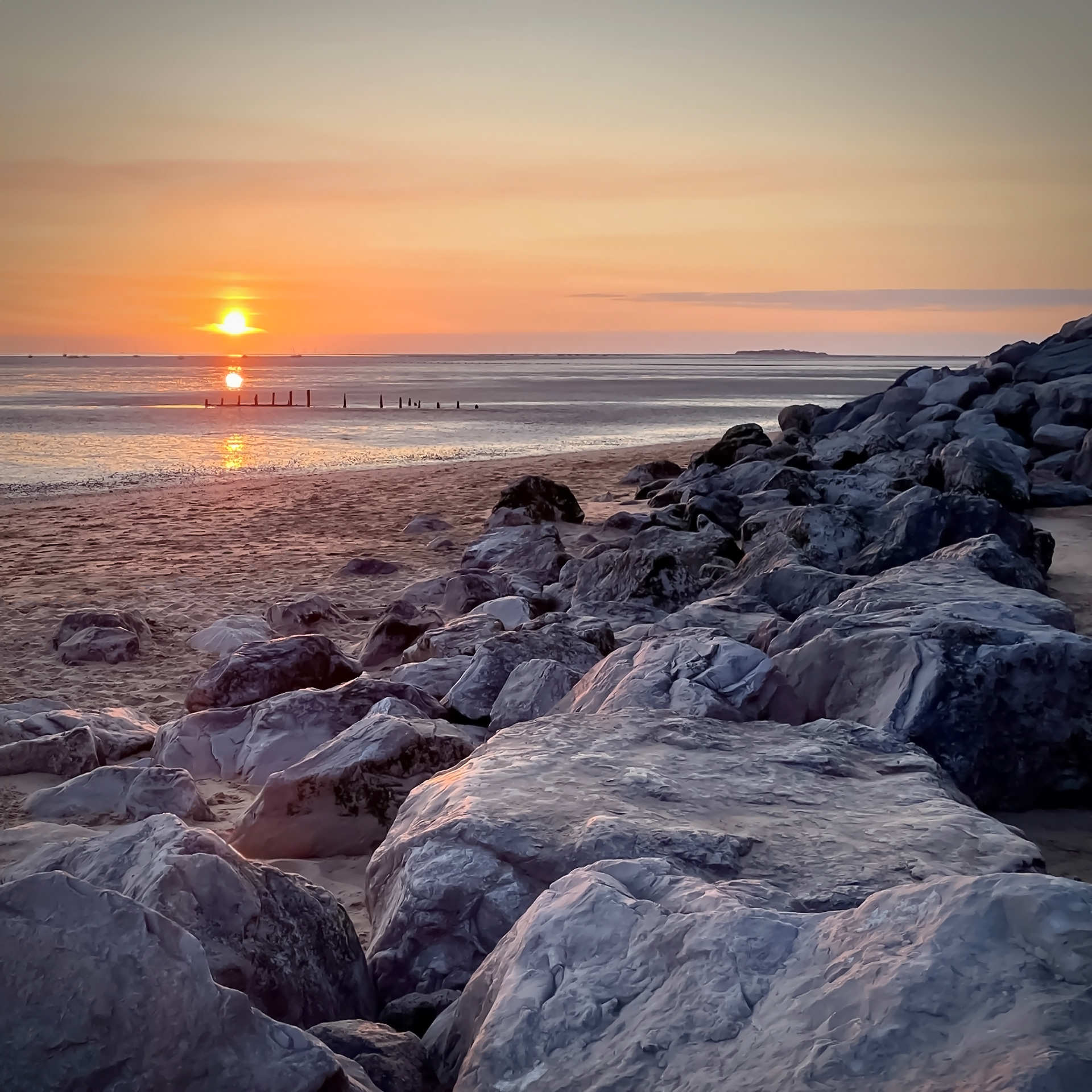 A Caldy Beach Sunset with Hilbre Island on the Horizon