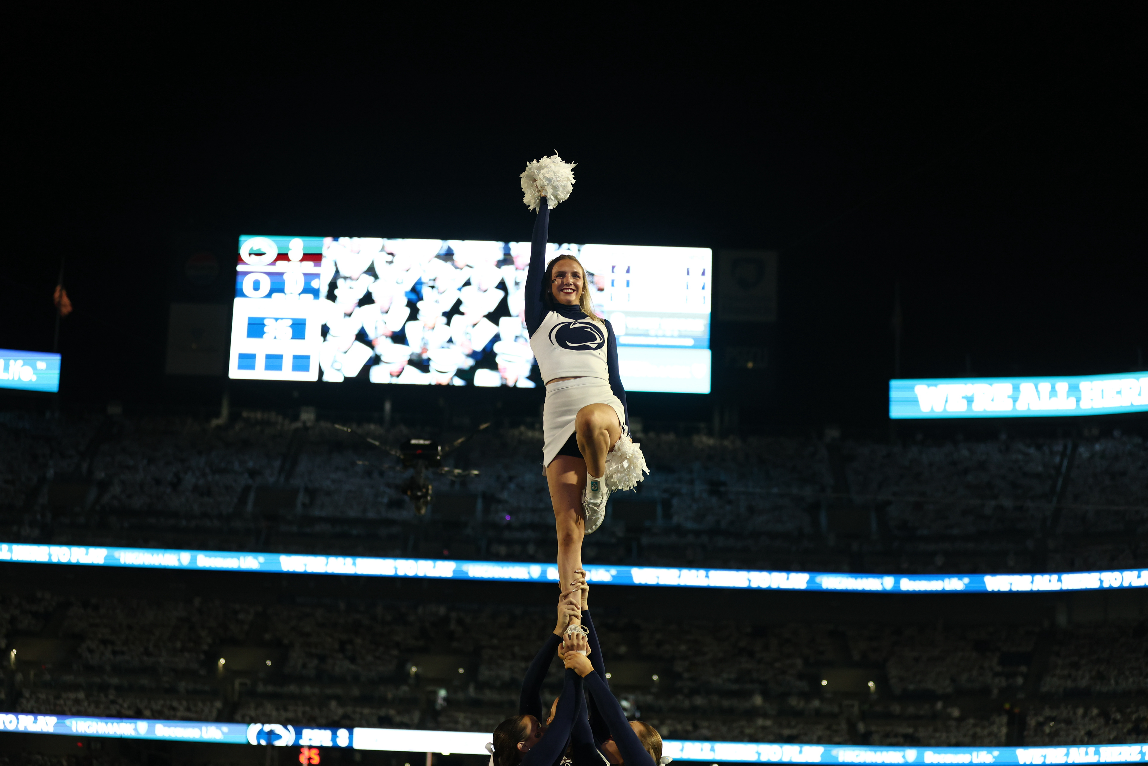 A cheerleader poses during Penn State's White Out game against Oregon at Beaver Stadium on Saturday, Sept. 27, 2025 in University Park, Pa. The Ducks beat the Nittany Lions in double OT 30-24.