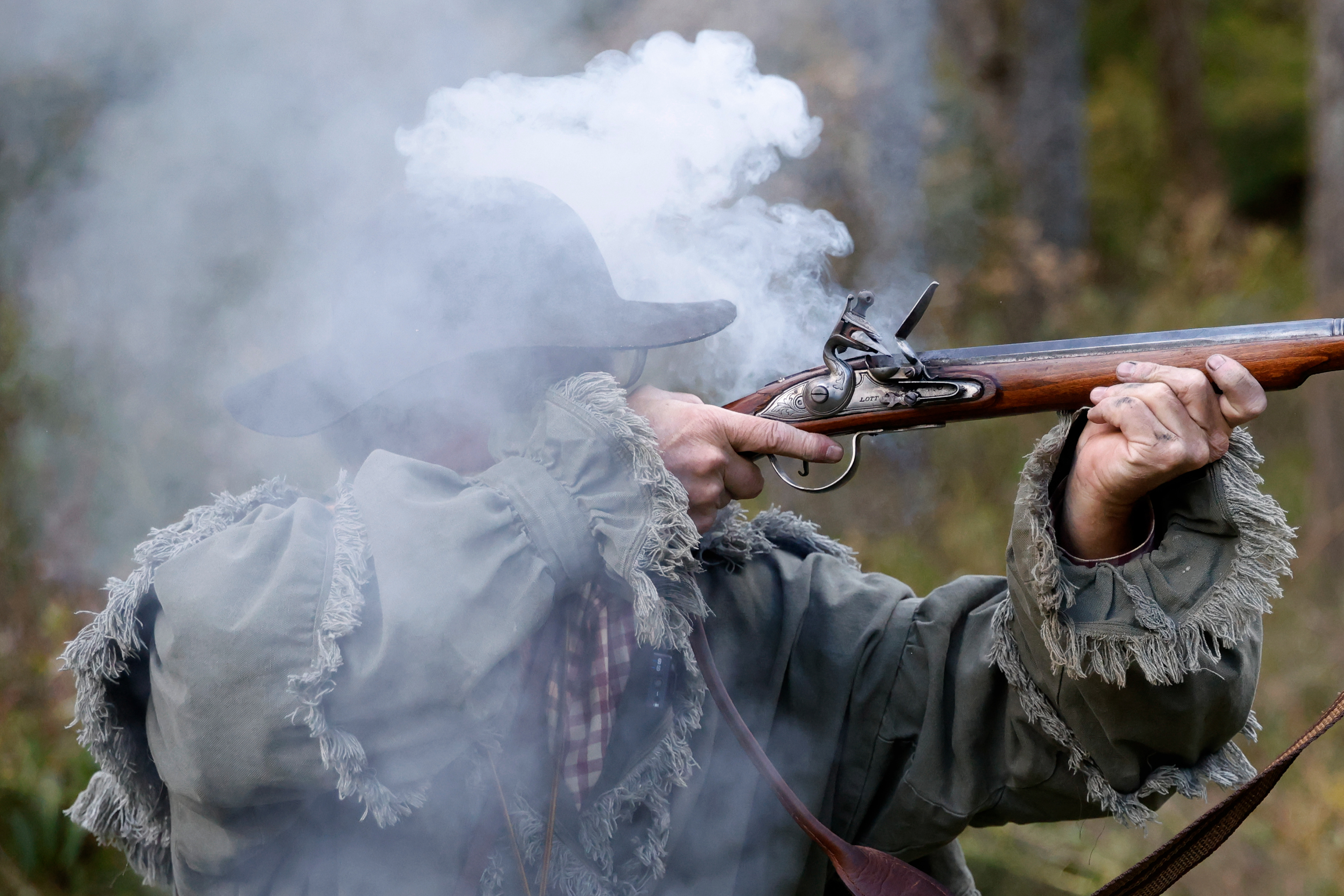 Mark Humphries fires a indian trade gun on Tuesday, Oct. 21, 2025 in Maysville, Ky.