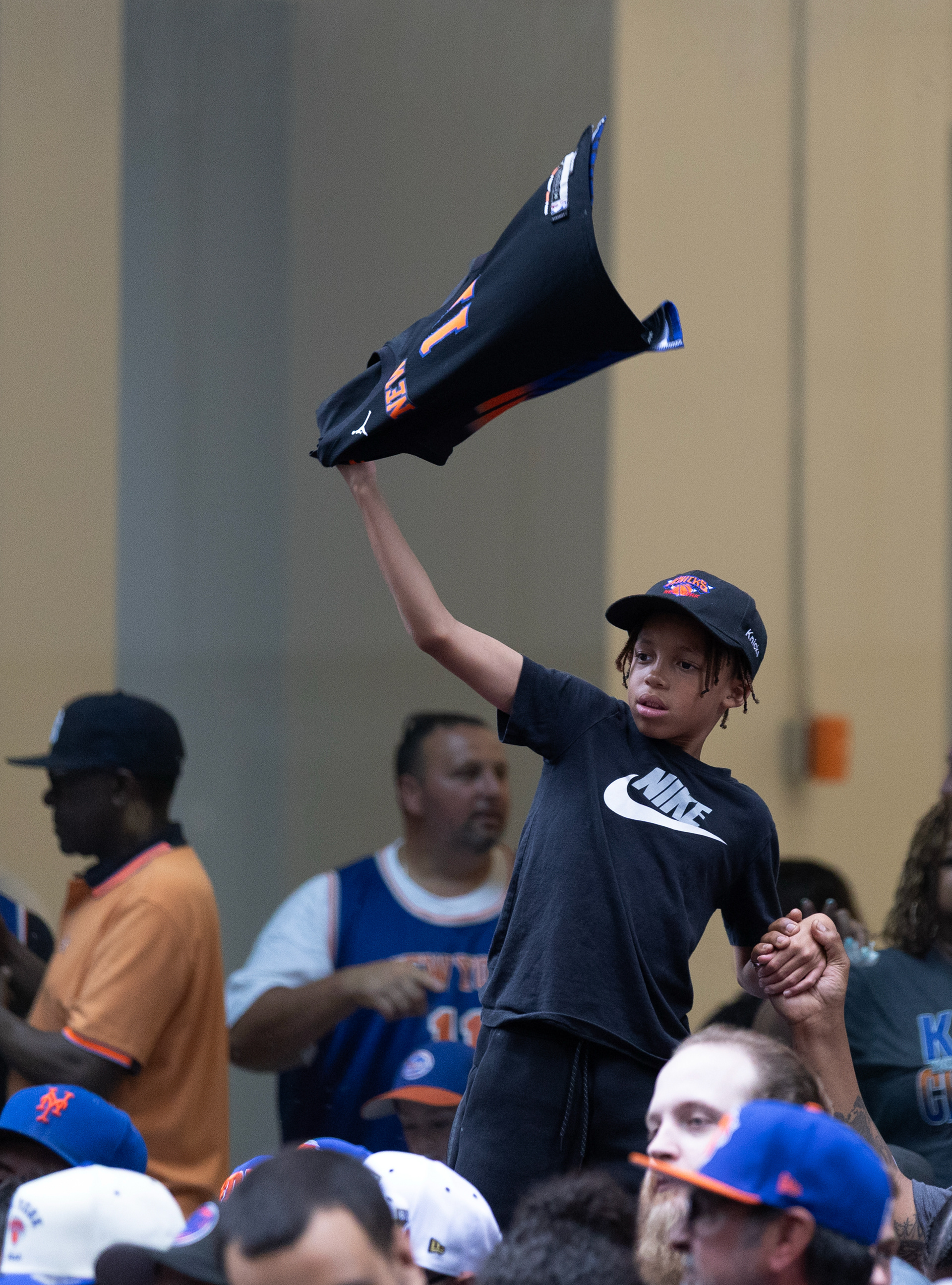 A child waves a Jalen Brunson jersey before the Knick’s ticker tape parade on Thursday, June 18, 2026 in New York, N.Y.