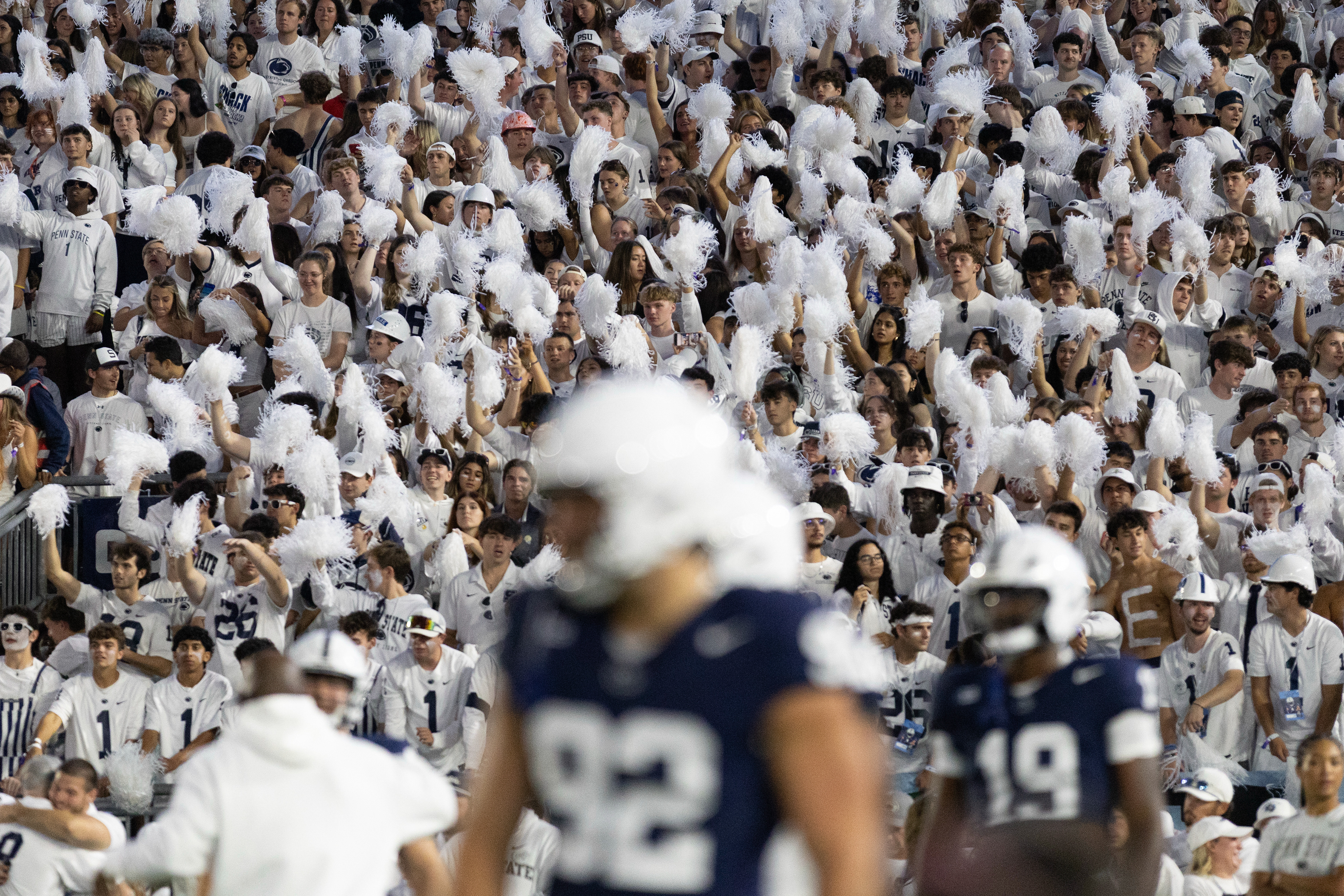 The crowd cheers as the Nittany Lions take the field during Penn State's White Out game against Oregon at Beaver Stadium on Saturday, Sept. 27, 2025 in University Park, Pa. The Ducks beat the Nittany Lions in double OT 30-24.