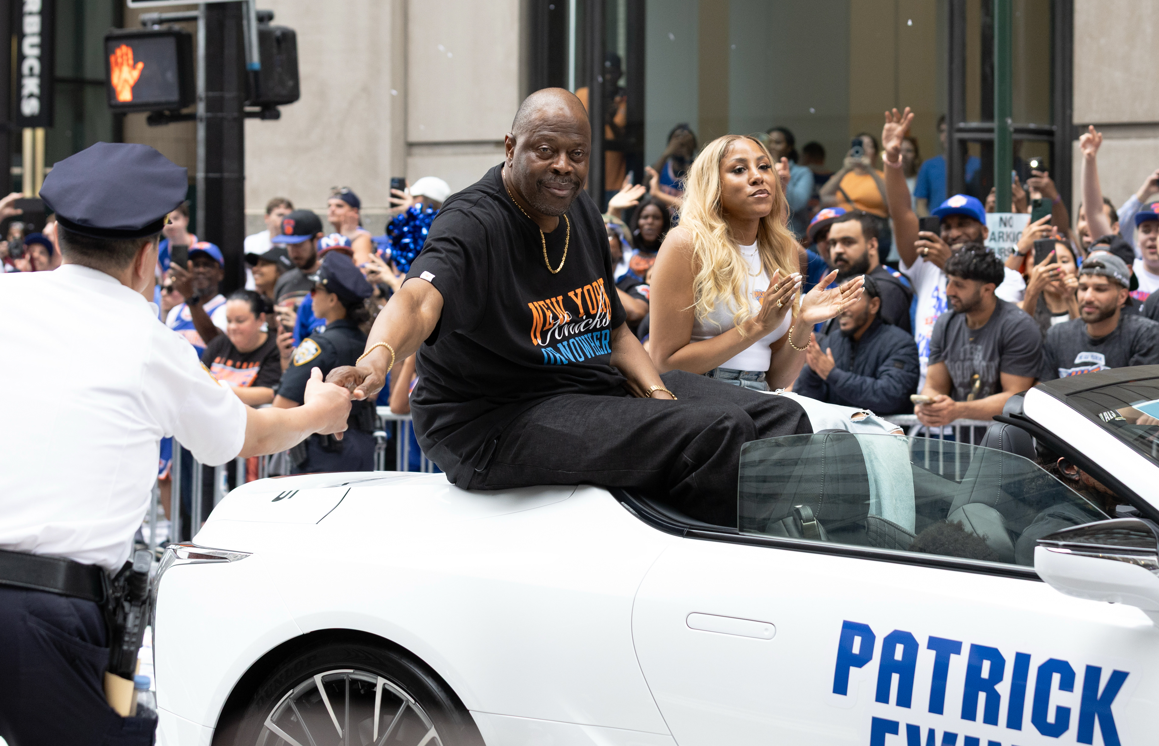 Patrick and Randi Ewing ride through the Knick’s ticker tape parade on Thursday, June 18, 2026 in New York, N.Y.