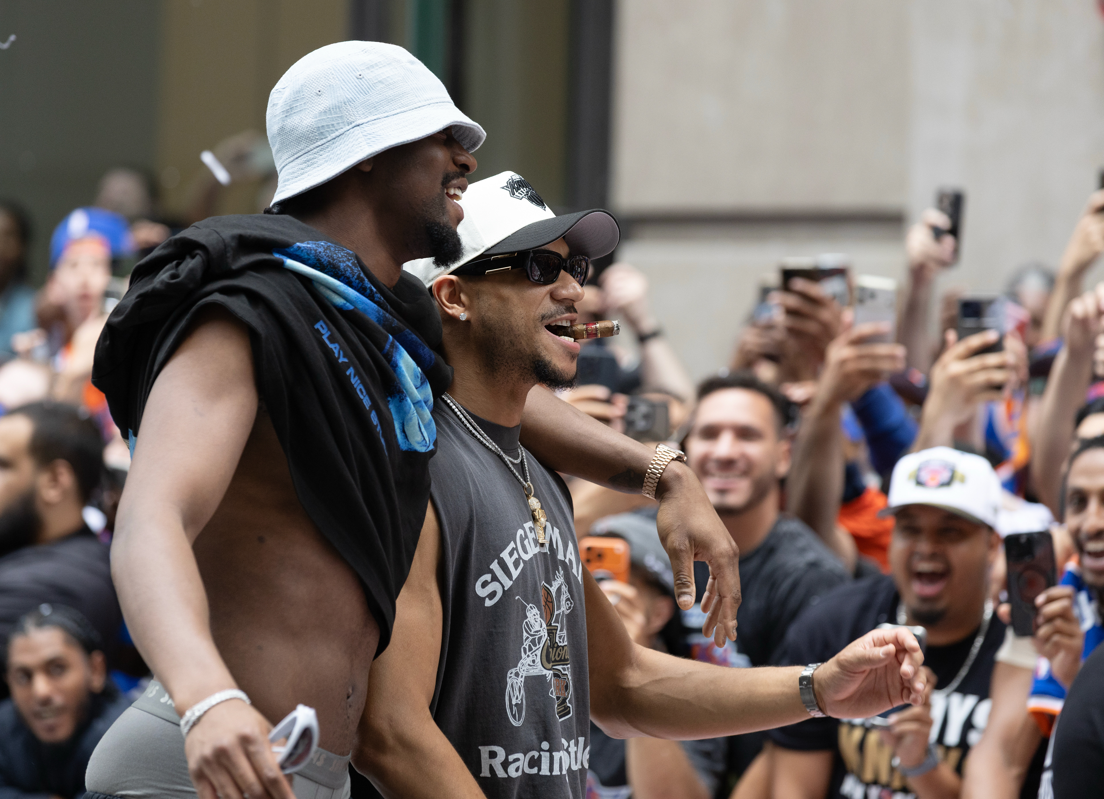 New York Knicks center Ariel Hukporti (55) and forward Josh Hart (3) walk together during the Knick’s ticker tape parade on Thursday, June 18, 2026 in New York, N.Y.