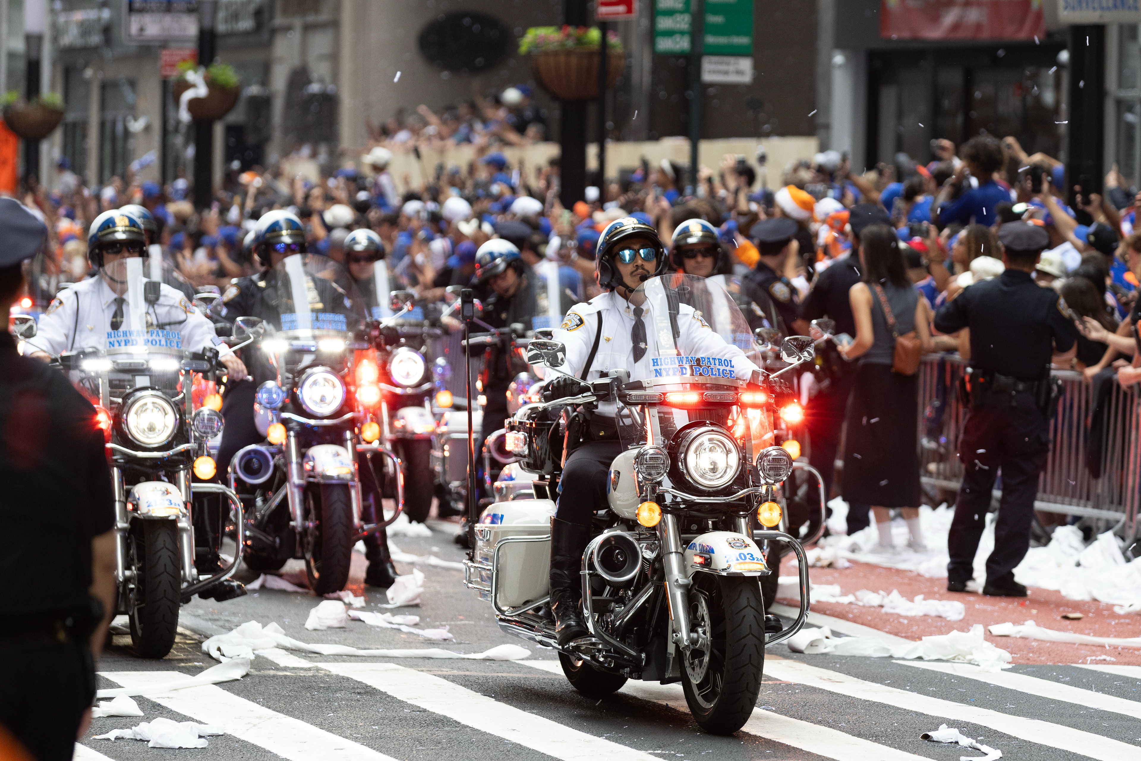 NYPD officers ride through the Knick’s ticker tape parade on Thursday, June 18, 2026 in New York, N.Y.