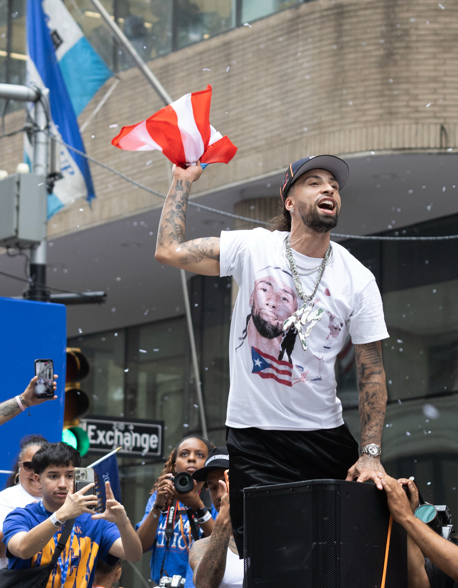 New York Knicks guard Tyler Kolek (13) cheers during the Knick’s ticker tape parade on Thursday, June 18, 2026 in New York, N.Y.