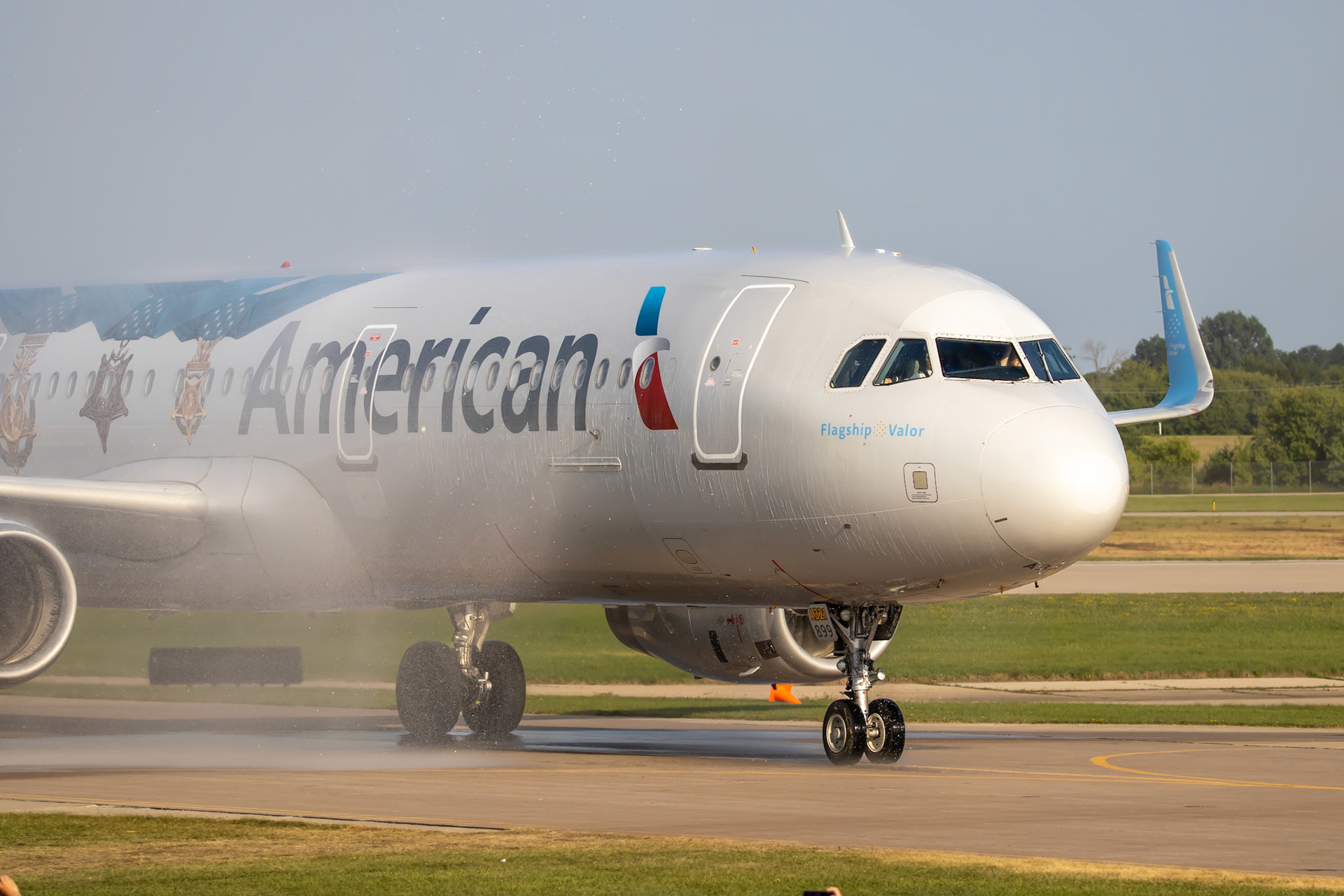 The Honor Flight arriving with a canon salute and water salute