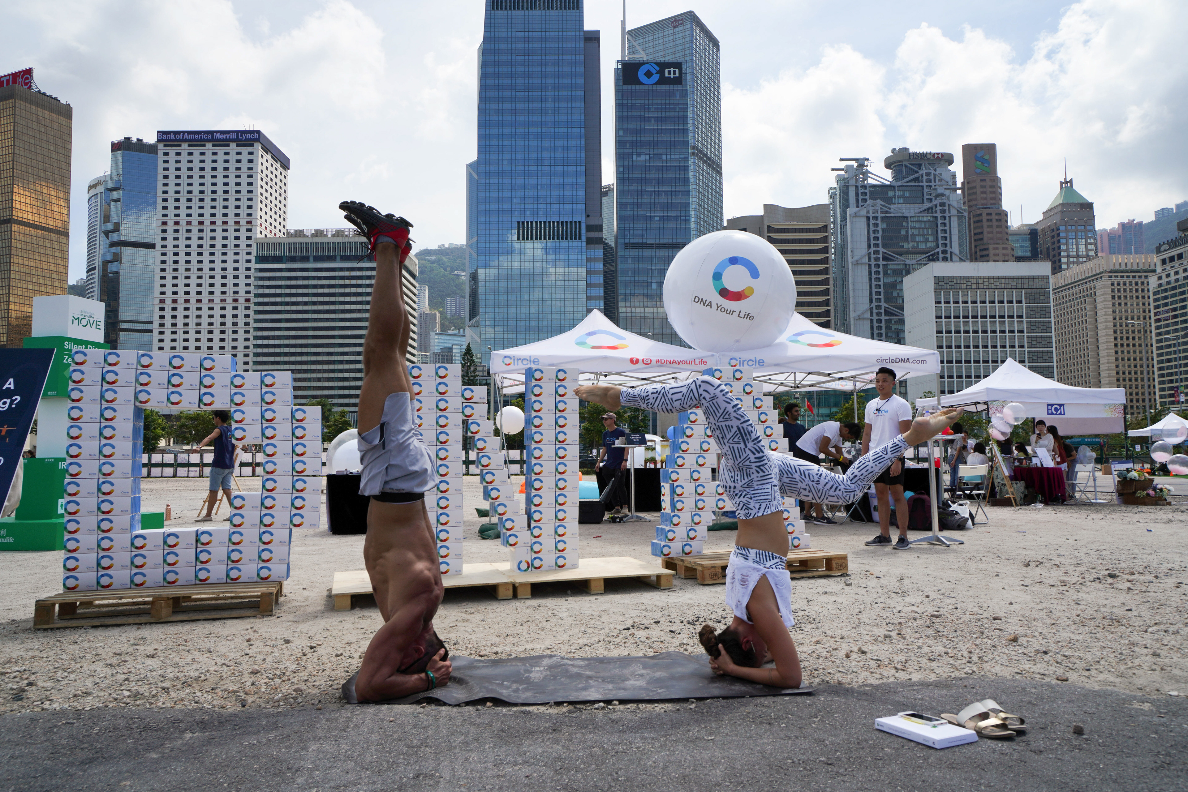 Doing a yoga pose in front of the Circle DNA Booth.