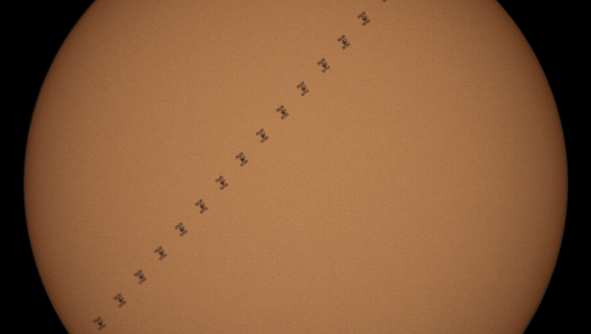 No, these aren't Tie Fighters: At 3:32pm (ET), the International Space Station transited the Sun.Visible from the Space Coast, John Kraus, Dan Batcheldor &amp; I were at Florida Institute of Technology to capture it. At a speed of 4.76 miles/sec, it was quick, just .62 secs!(Big thanks to Dr. Batcheldor for letting us use his telescopes for this shot -- as you can tell, I've actually got too much magnification as I couldn't get the full disc of the Sun in the frame!)