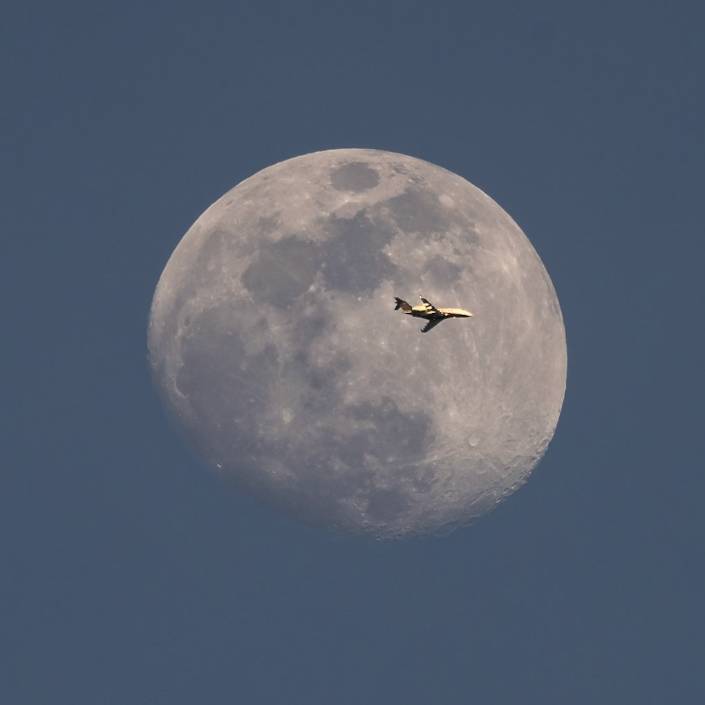 Seen from Melbourne, Florida passing in front of the Moon, a Bombardier Challenger 300 jet flying at 18,000ft &amp; 345kts, traveling from TEB (Teterboro, NJ) to BCT (Boca Raton, FL).Pic: me, Friday, Jan 14, 2022(Thanks, FlightRadar24, for the flight data)