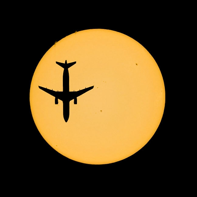 Welcome to the Sunshine State: That's American Airlines flight AA1837 traveling from PHL to PBI, seen from the Space Coast of Florida passing in front of the Sun. The Airbus A321 was flying at 26,000ft &amp; 426kts. Captured using a Canon R5 + RF100-500 w/ 1.4x TC with a proper solar filter (and sunblock for my face, as I was shooting handheld.)(📷: me, flight data by Flightradar24.com)— in Melbourne, Florida.