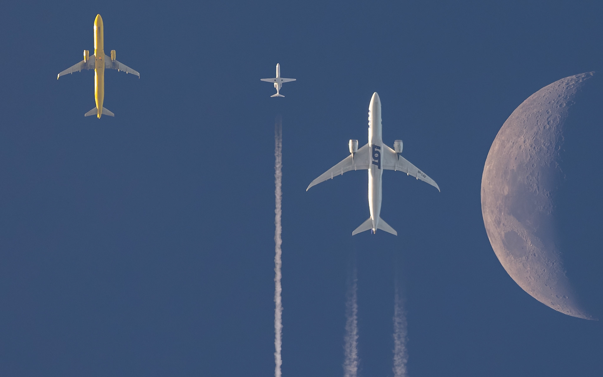 "Lunar Air Traffic," or " An Airbus, a Cessna, and a Boeing walk into a bar." (working title)Before you start shouting, "THIS IS FAKE," this is, in fact, a composite using the LOT Polish Airlines Moon flyby (I posted a slightly later frame last night) as a base frame. It started as an experimental image and an attempt to show just under 7 minutes of activity Saturday night, and it's grown on me quite a bit since I assembled the first version. It needs a bit of explanation, and along the way, it might give context to these shots.I was focused mainly on the flights headed toward Miami International Airport (MIA) because they usually fly nearly directly over my house in a (generally) north-to-south heading. Using The Photographer's Ephemeris, I knew the waxing Moon would pass over the route (from my home-based perspective) starting at ~5:20 pm until maybe 5:45 pm. Using Flightradar24.com, I could see three flights might be overhead in that time window.For this composite, I've aligned each of the frames on the Moon, which is moving East to West or from right to left, narrowing the gap between the flight route and the Moon as time passes.The first plane to arrive overhead was the one to the far left, arriving at 5:26 pm; it was close enough that I could get it and the Moon in a 700mm frame, which meant anything arriving after would be even closer. At 5:31 pm came the Cessna jet, which meant the Boeing 787 I had been watching for quite a while was in play. It arrived at 5:33 pm, close enough that if it were delayed even 90 seconds, it'd have likely passed directly in front of the Moon.Unfortunately, there wasn't anything in the route behind the 787 for another 20 minutes, and by then the Moon was too far West and, thus, far from the flight route.Flight details:1. An Airbus A321-231 (reg N668NK) operated by Spirit Airlines. Flight 941 was traveling from Raliegh-Durham (RDU) to Miami (MIA) at 36,000 feet and 441 knots. (far left)2. A Cessna 525B Citation CJ3+ (reg N701JS) operated by FlyExclusive, LLC. Flight 701 was traveling from Augusta (AGS) to Ocean Reef (OCA) at 38,229 feet and 440 knots, probably after a day at the Master's. (middle)3. A Boeing 787-9 Dreamliner (reg SP-LSG) operated by LOT Polish Airlines. Flight LO29 was traveling from Warsaw (WAW) to Miami (MIA) at 37,378 feet and 499 knots. (far right)#planespotting #avgeek
