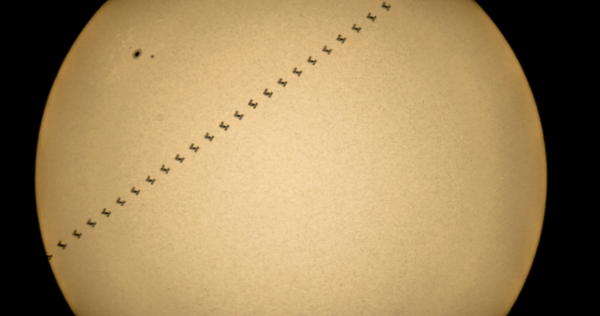 My first field use of the 8" Celestron scope that I intend to use for the eclipse resulted in this: a solar transit of the International Space Station, seen here from Sebastian, Florida. at 5:10 pm on Thursday, August 3, 2017.I didn't have much time to set get set up, particularly because the rain was coming down in buckets until just about 15 minutes before the transit occurred. But the real thing I learned is quite obvious: I've got too much zoom. Even with a full-frame camera, I can't get the full face of the Sun in the frame. Specs:ISO640, 1/2000 exposure time, shot at 29 fps using a Canon 5D4. 24 frames extracted and combined in Photoshop, with initial edits done in Lightroom.  Transit details, with thanks again to transit-finder.com for the accurate prediction: Thursday 2017-08-03 17:10:39.54  •  Solar transitISS angular size: 44.09″; distance: 626.73 kmAngular separation: 0.5′; azimuth: 270.8°; altitude: 38.0°Center line distance: 0.11 km; visibility path width: 7.68 kmTransit duration: 0.90 s; transit chord length: 31.5′R.A.: 08h 56m; Dec: +17° 16′; parallactic angle: -53.1°ISS velocity: 34.8 ′/s (angular); 6.35 km/s (transverse)ISS velocity: -3.76 km/s (radial); 7.38 km/s (total);Direction of motion relative to zenith: -42.4°Sun angular size: 31.5′; 42.9 times larger than the ISS(Photo by Michael Seeley)