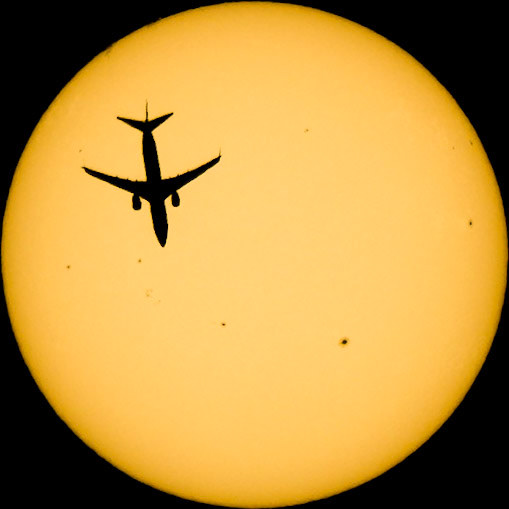 Saturday solar transit from the Space Coast of Florida: WestJet flight 2032 flying from Toronto (YYZ) to George Town (GCM). The Boeing 737-8CT was flying at 36,000 feet and 499 knots. Its registration is C-GWSZ, aka "Walt Disney World - Mickey Mouse Livery."(📷: me; flight data by Flightradar24.com)