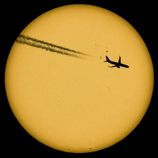 That's American Airlines flight 1698 passing in front of the Sun, seen Saturday from the Space Coast of Florida. The Boeing 737-823 was traveling from Miami (MIA) to Charlotte (CLT) at 37k feet &amp; 468 knots. Standard safety tips apply: don't look at the Sun without protection. For this shot, I'm using a Luzid solar filter, which is why the sky around the Sun is completely dark.(📷: me w/ flight data by Flightradar24.com)