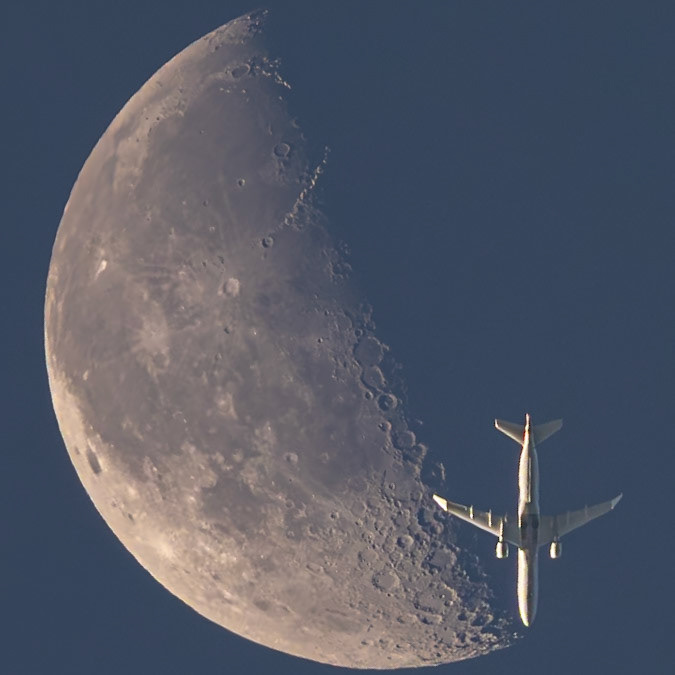 Saturday morning seemed to be the best time for the Moon (now nearly directly overhead this time of year) to align nicely with the nearby flight route. But, by the time the morning flights were overhead (6:45 a.m. or so), the Moon was already too far west. The Moon rises about an hour later each day, so Sunday would be the day. Enter daylight savings time. It effectively nullified the hour shift I was hoping for. (It also caused 8-year-old Lauren to wake up at 5 a.m., but that's a different story.) The first plane, again at 6:45 a.m., was to the East of the Moon, just like Saturday morning. As a general rule, I don't chase the plane transits. They've all been captured from my driveway. But I could see on FlightRadar24 that there were three more planes tucked into the route, so Lauren and I started driving East. The following two planes were still too far East, but 2 miles from home, we caught this transit. This is American Eagle flight 3660, operated by Envoy, passing in front of the Third Quarter Moon, seen from the Space Coast of Florida. The Embraer E175LR was traveling from Charleston (CHS) to Miami (MIA) at 36,000 feet and 462 knots. I want to say that I had a magic formula to tell me exactly where to stand, but there's a bunch of luck involved here. Afterward, Lauren declared that she was my "lucky charm." Also, Lauren firmly believed this was the frame to post; I favored the next frame, but she was right. Shout out to John Kraus for his consultative advice with the post-processing, and, for the record, he agreed with Lauren that this was the frame to post, not the one after. If you aren't following him, you should be.