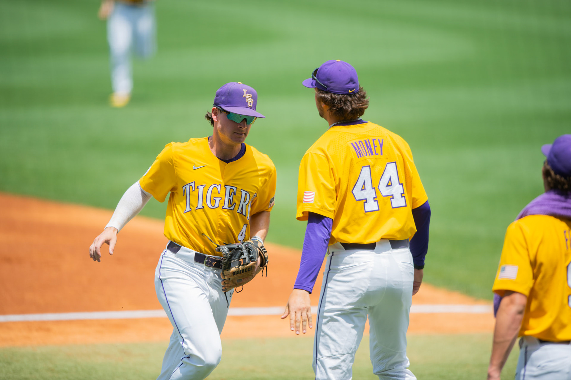 LSU baseball sophomore infielder Cade Doughty (4) high fives sophomore right-handed pitcher Blake Money (44) Sunday, May, 1, 2022, during the Tigers’ 4-3 walk-off win against the Georgia Bulldogs at Alex Box Stadium in Baton Rouge, La.