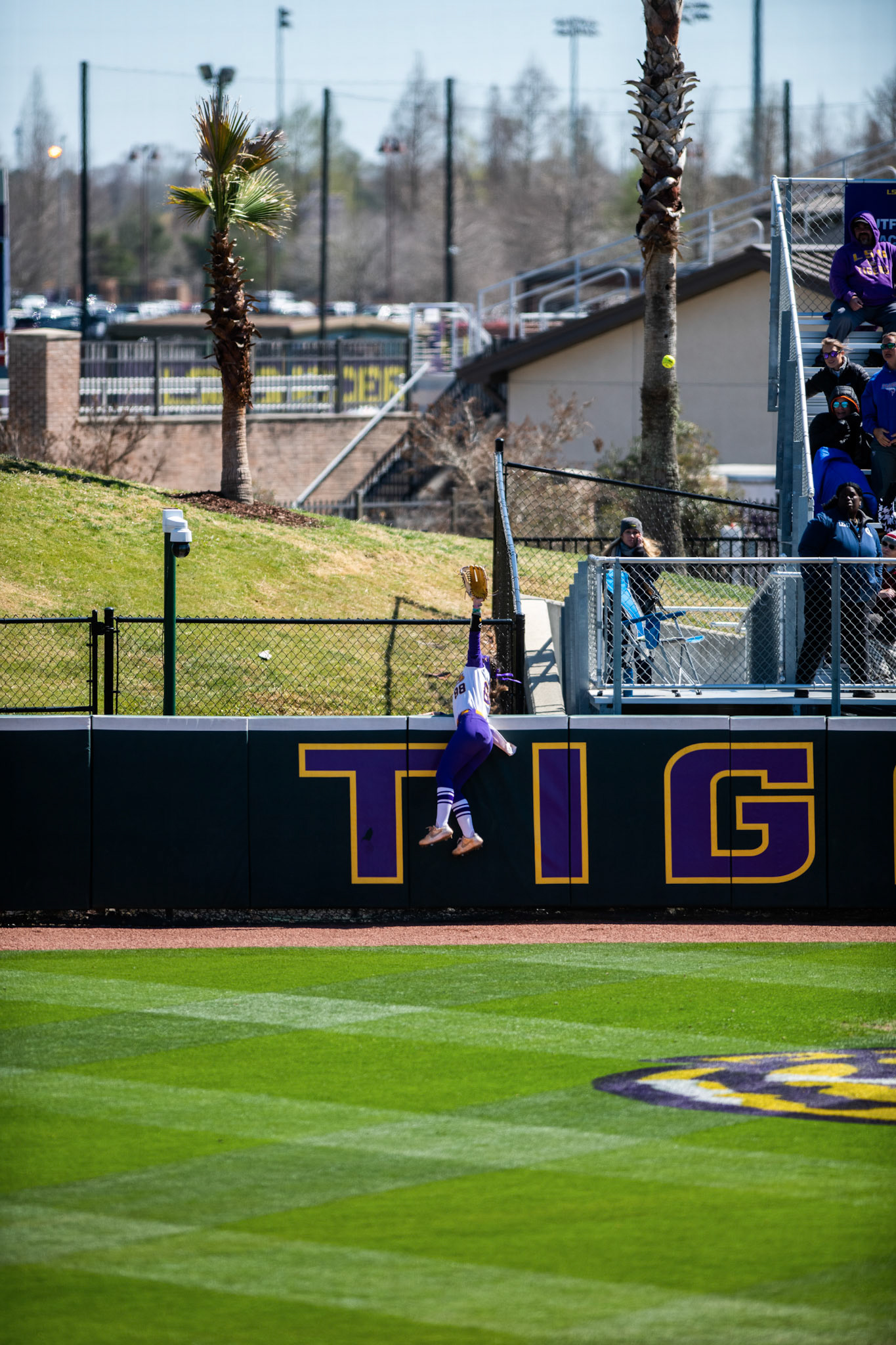 LSU softball redshirt sophomore outfielder Ciara Briggs (88) misses a home run ball hit by an Alabama softball player Saturday, March 12, 2022 during LSU's 13-6 win against Alabama at Tiger Park in Baton Rouge, La.