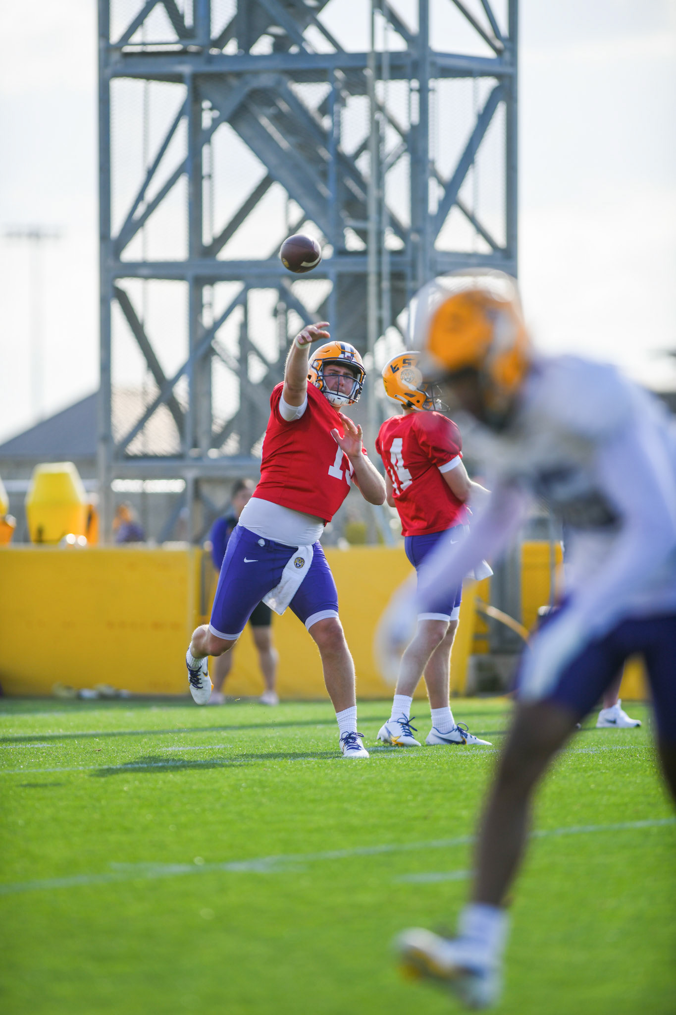 LSU football 5th year senior quarterback Myles Brennan (15) throws the ball Tuesday, March 29, 2022 during LSU's spring practice in Baton Rouge, La.