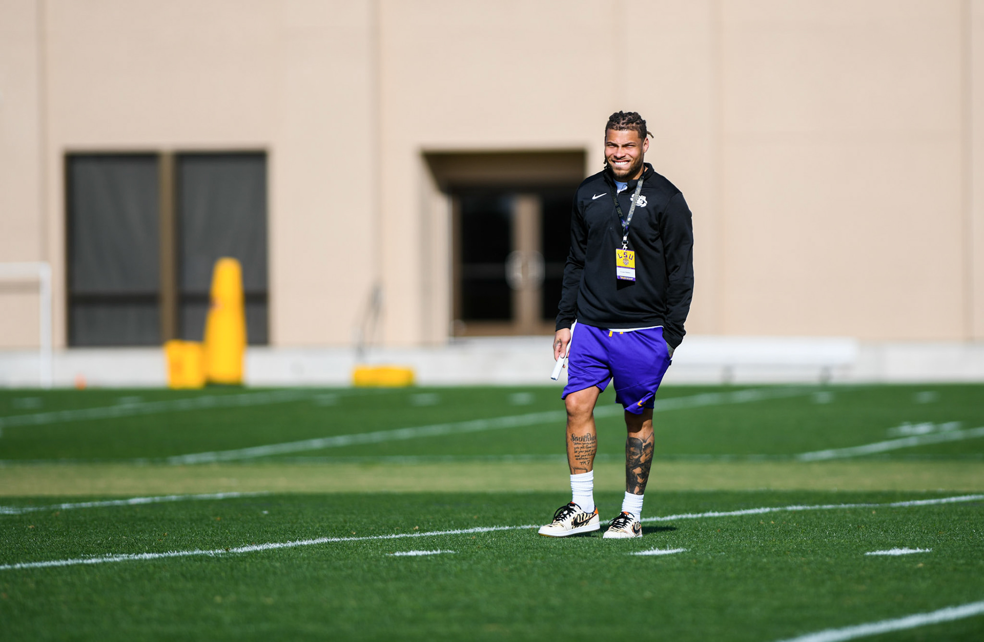 Former LSU football safety and Super Bowl Champion Tyrann Mathieu watches practice Tuesday, March 29, 2022 during LSU's spring practice in Baton Rouge, La.