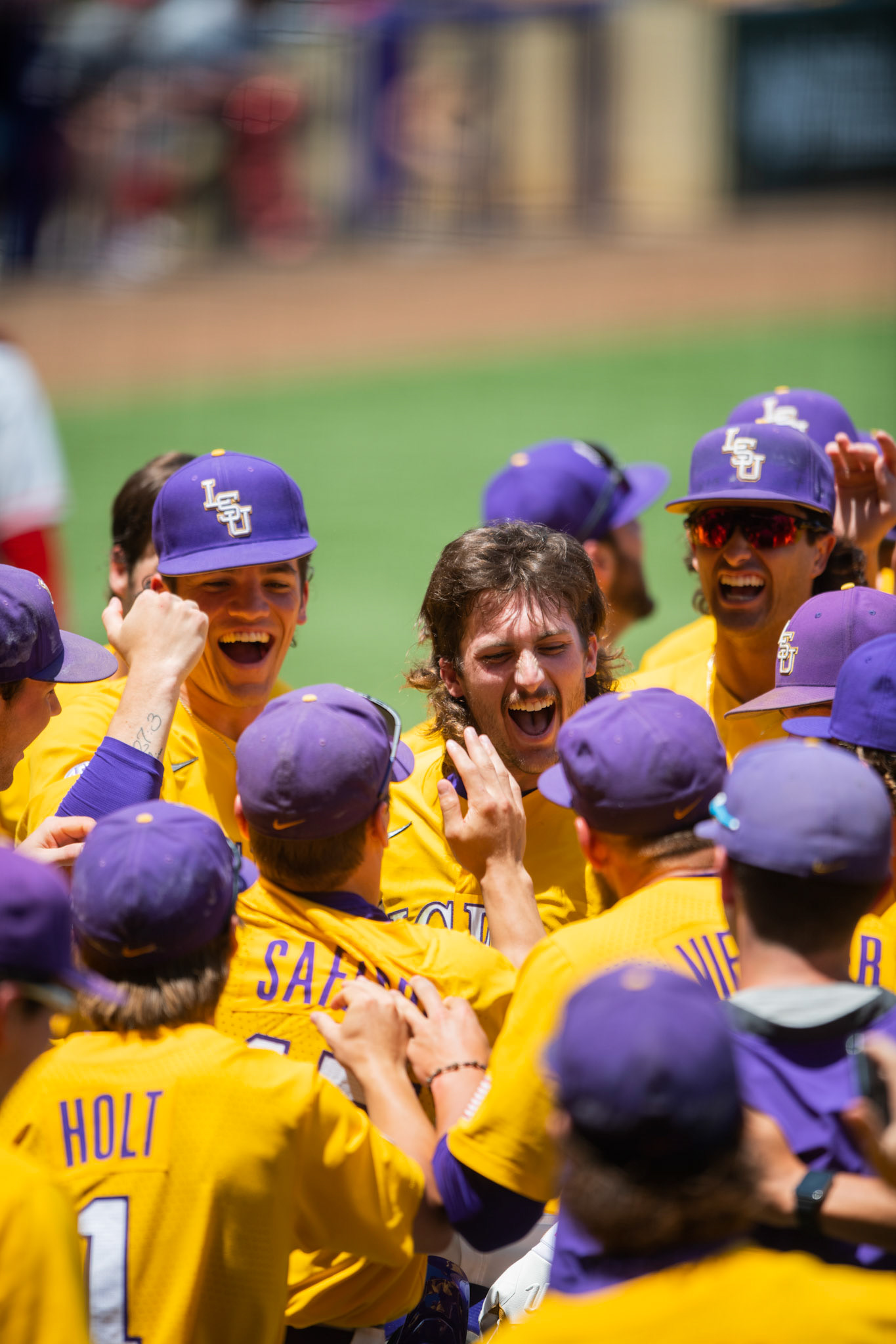 LSU baseball sophomore outfielder Dylan Crews (3) celebrates with his teammates after hitting a homerun Sunday, May, 1, 2022, during the Tigers’ 4-3 walk-off win against the Georgia Bulldogs at Alex Box Stadium in Baton Rouge, La.
