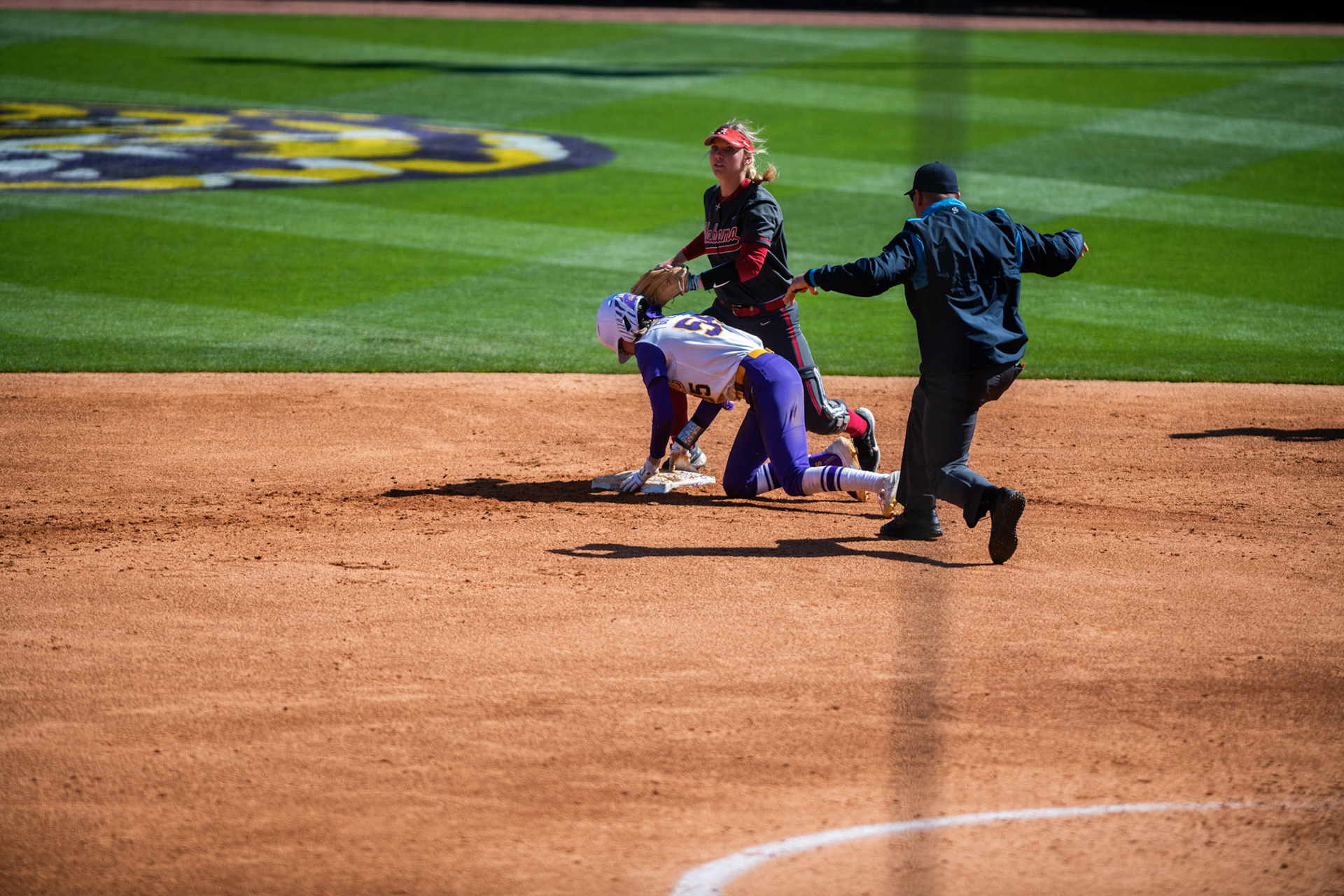 LSU softball redshirt sophomore Raeleen Gutierrez (55) slides safely into second base Saturday, March 12, 2022 during LSU's 10-6 ___ against Alabama at Tiger Park in Baton Rouge, La.