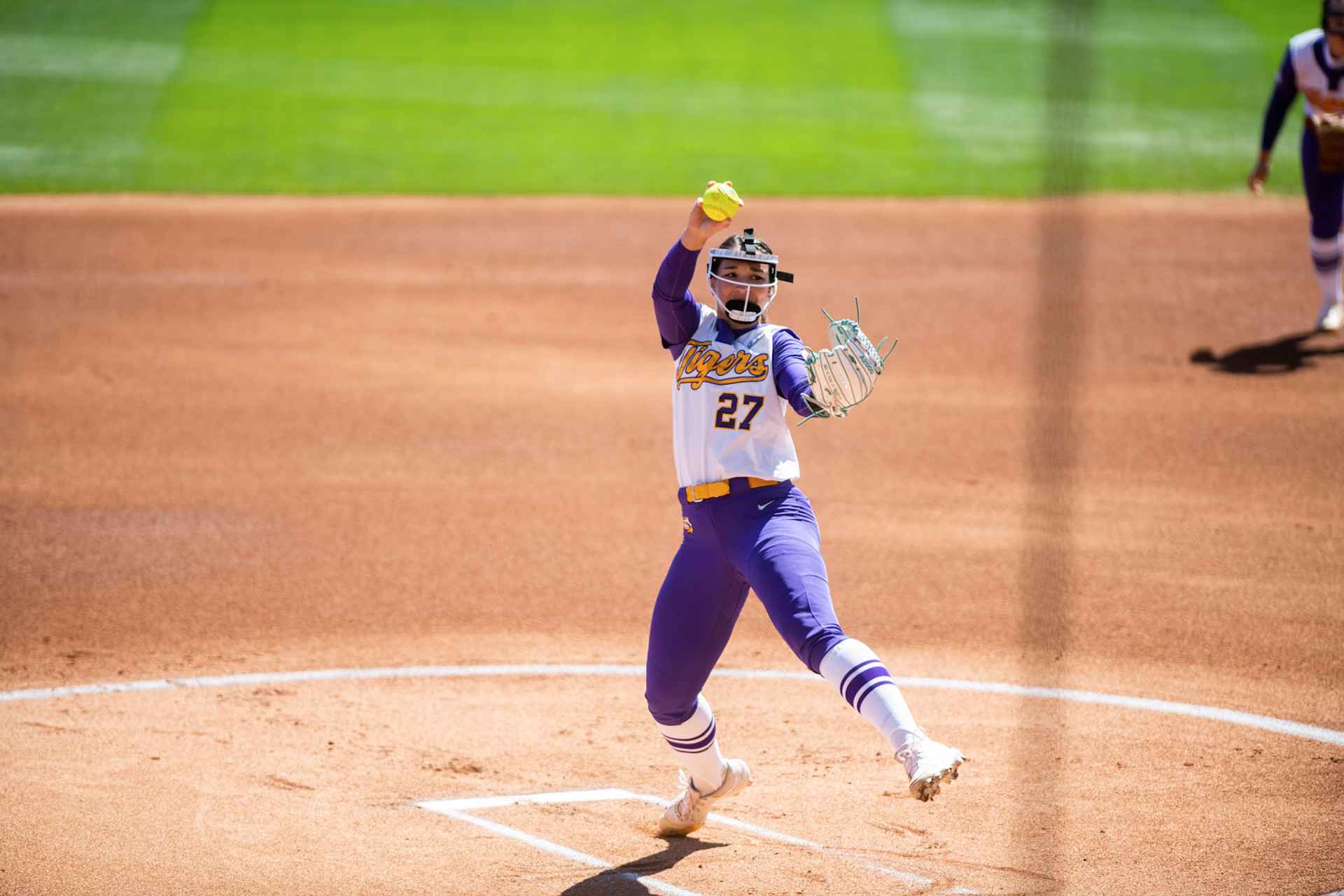 LSU softball 5th-year senior pitcher/utility Shelbi Sunseri (27) pitches Saturday, March 12, 2022 during LSU's 13-6 win against Alabama at Tiger Park in Baton Rouge, La.