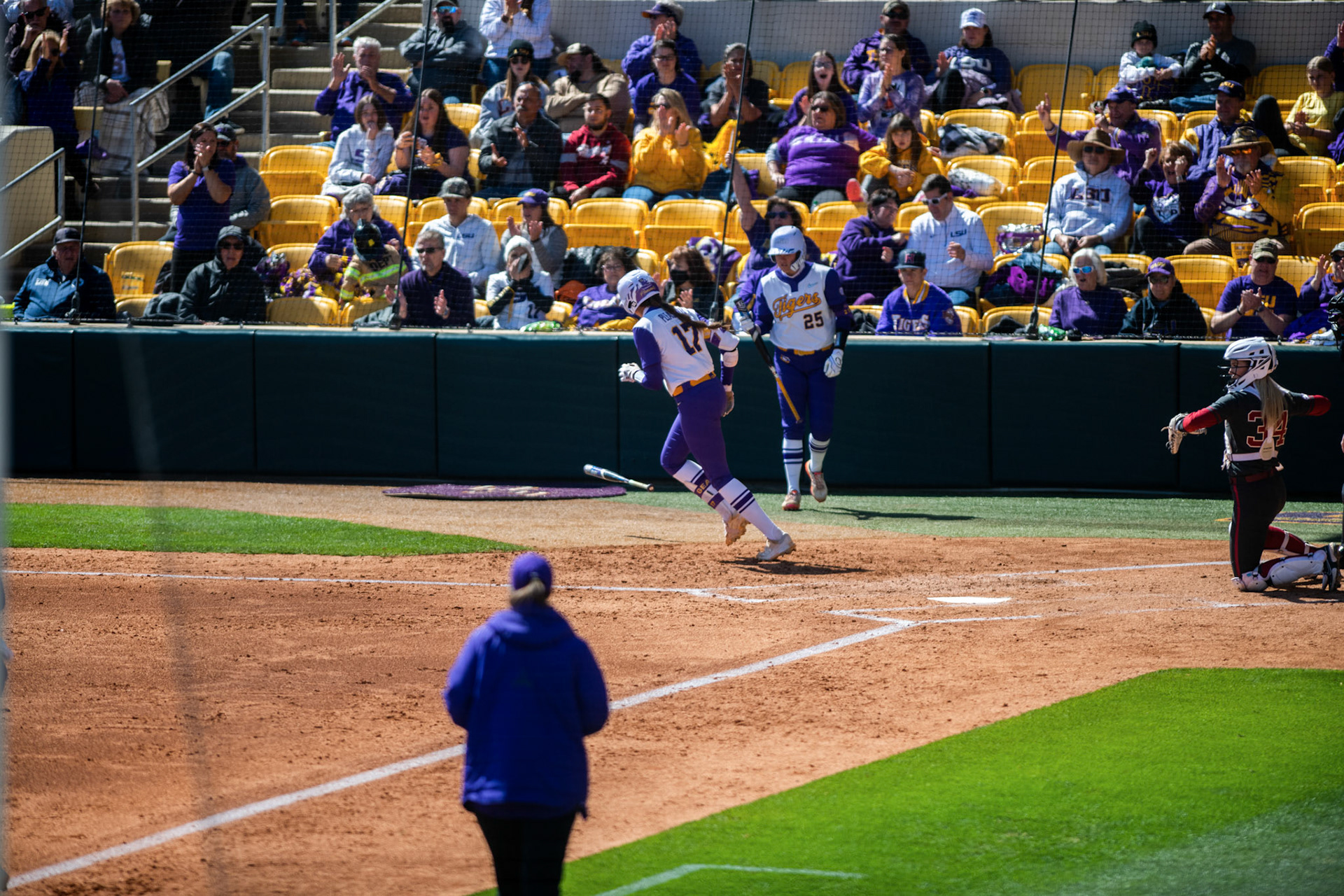 LSU softball redshirt sophomore infielder Taylor Pleasants (17) takes her free base Saturday, March 12, 2022 during LSU's 13-6 win against Alabama at Tiger Park in Baton Rouge, La.