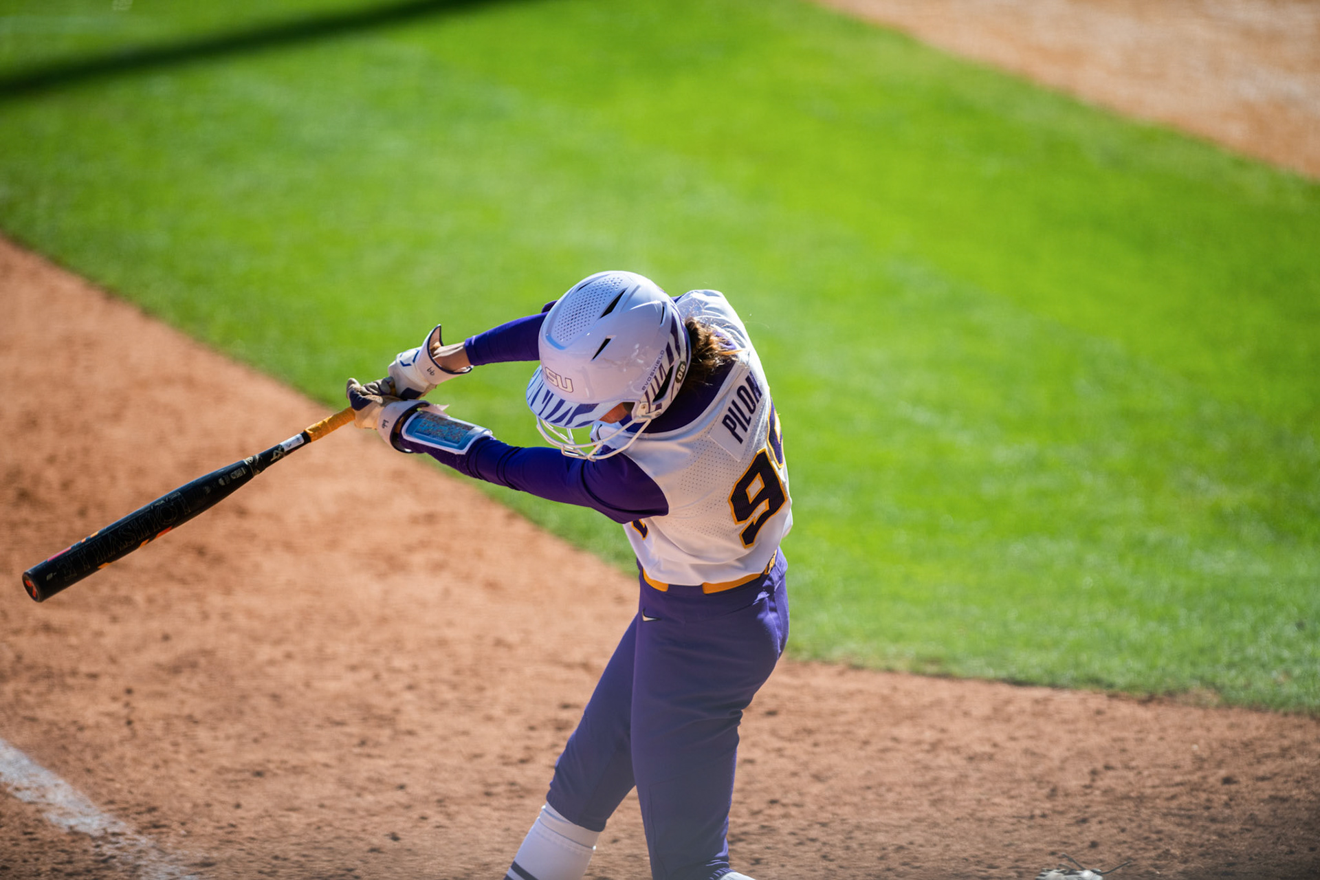 LSU softball redshirt freshman infielder Presley Pilon (99) swings Saturday, March 12, 2022 during LSU's 13-6 win against Alabama at Tiger Park in Baton Rouge, La.