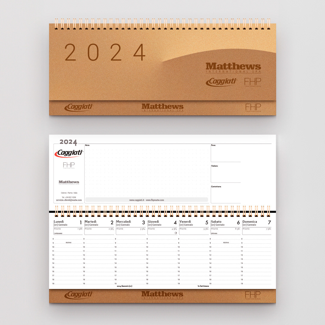 Pagine interne del calendario agenda da scrivania Caggiati con layout editoriale istituzionale per settore arte funeraria.