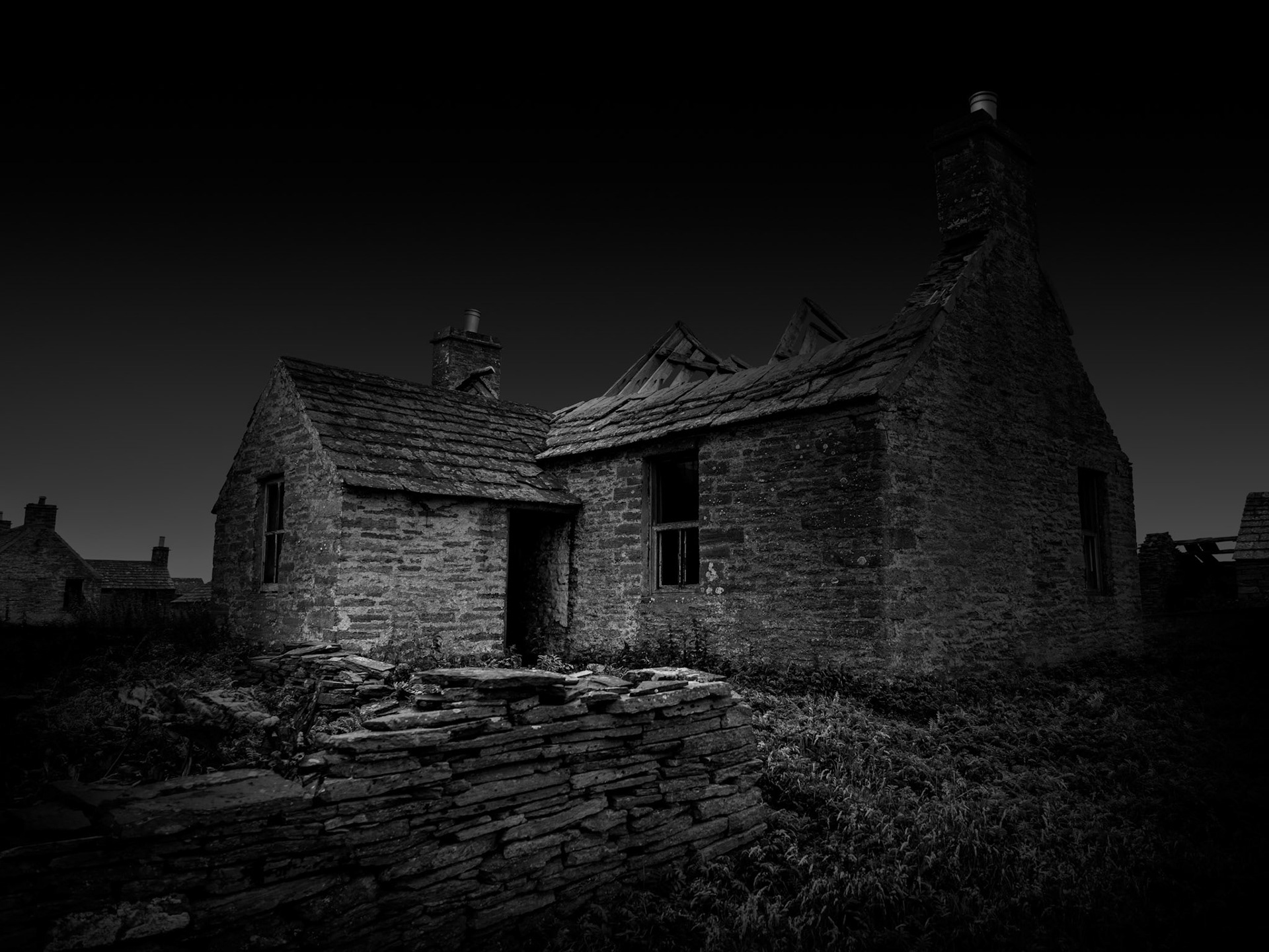 For generations, Stroma supported a small but resilient community whose lives were shaped by farming, fishing and the surrounding waters of the Pentland Firth. Today the remains of many of its crofts stand roofless and exposed, their stone walls gradually being reclaimed by the landscape. The last permanent islanders left Stroma in 1962, bringing centuries of continuous settlement to an end. This photograph concentrates on the physical traces they left behind, using controlled light to separate the ruined buildings from the surrounding darkness. Rather than treating the croft simply as a picturesque ruin, I wanted it to retain a sense of solidity and presence: something constructed through human effort that continues to occupy the landscape long after its purpose has disappeared.Stroma is an ongoing photographic project which I am currently developing.