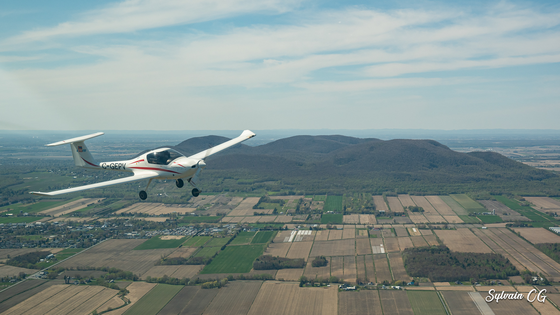 Katana DA-20 (C-GPEV) from Cessna 172N (C-GNLR) - YHU