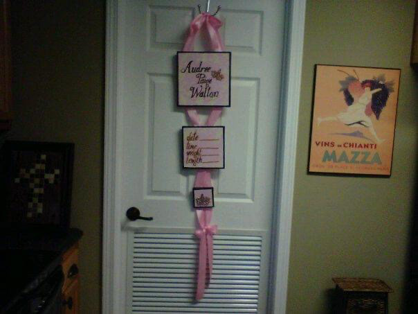 Canvas painting, satin ribbon and jewel accents.