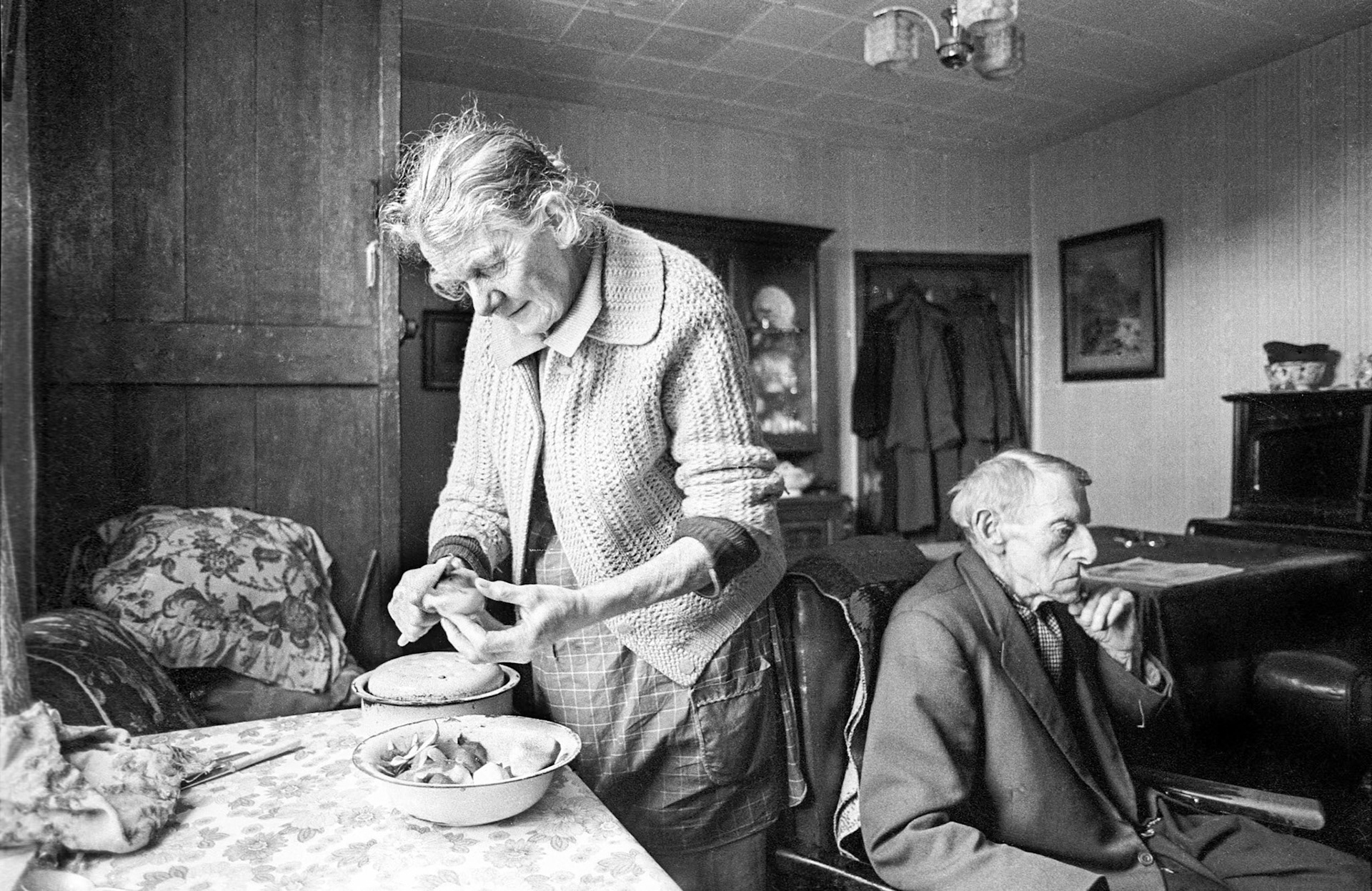 Lewis Lewis and his wife Martha - Lewis was a collier and a music teacher. Outside his front door was a brass plaque that read “Lewis Lewis Piano Teacher”. Martha was preparing lunch.