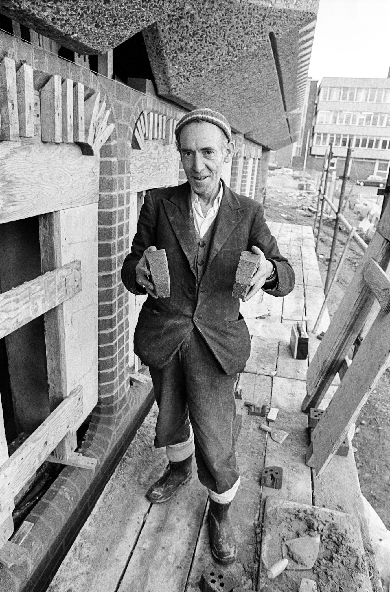 Billy Bricks “Delilah” - After a few pints he would shuffle up and down the bar singing Tom Jones’ Delilah. His leg movements were not unlike Michael Jacksons’ moonwalking - he was years before his time. Billy was a very skilled bricklayer. When a new court building was being constructed in the town there was only one man who could do the brickwork. However, the contractors had to employ a man just to ensure Billy didn’t sneak off to the pub before the end of shift. He can be seen here working on one of the windows