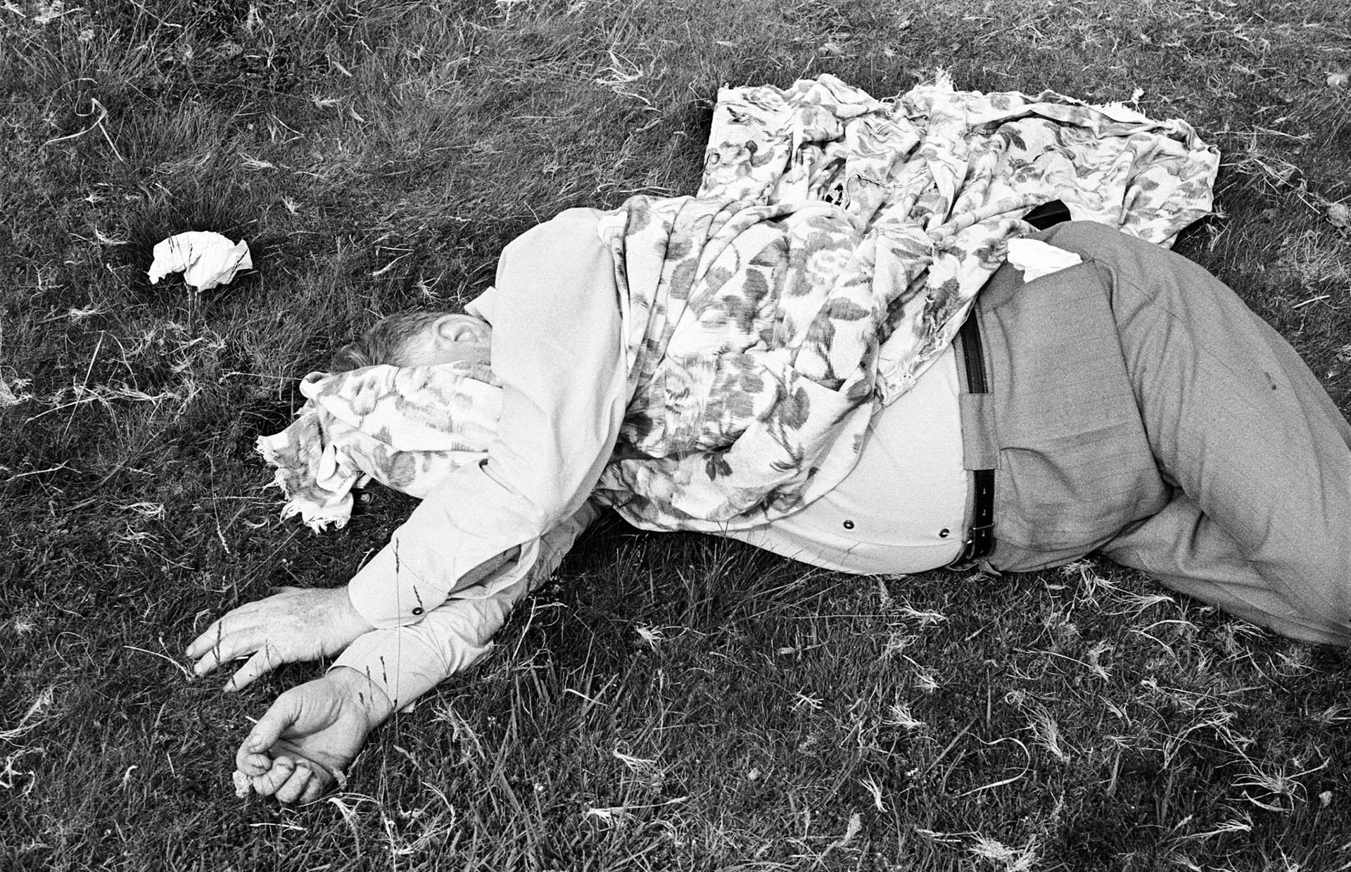 Uncle Les asleep in the sun - Les was my Auntie Rhoda’s husband. On Sundays in the summer they would often take me out in the car for a picnic. Les liked to drive to the nearby Brecon Beacons. There we would have sweet tea, ham sandwiches and cream cakes laid out on a cloth. Afterwards Les would invariably fall asleep in the sun. Rhoda would worry about him being burnt and would attempt to cover him with the cloth. It was a miracle she never suffocated him. I always remember an occasion at their home when she once woke him up because he hadn’t taken his sleeping tablet.