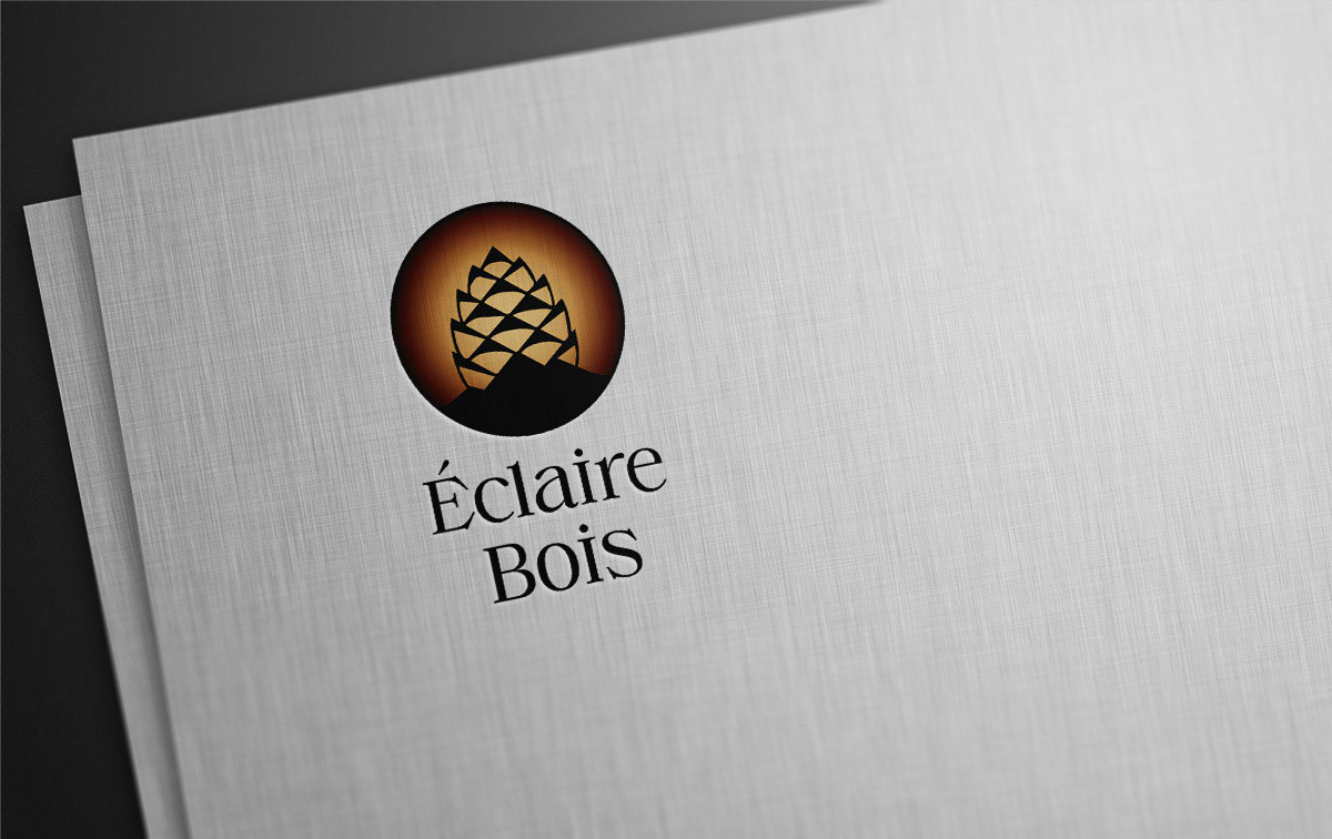 Conception et réalisation du logo de Éclaire Bois au Percy
