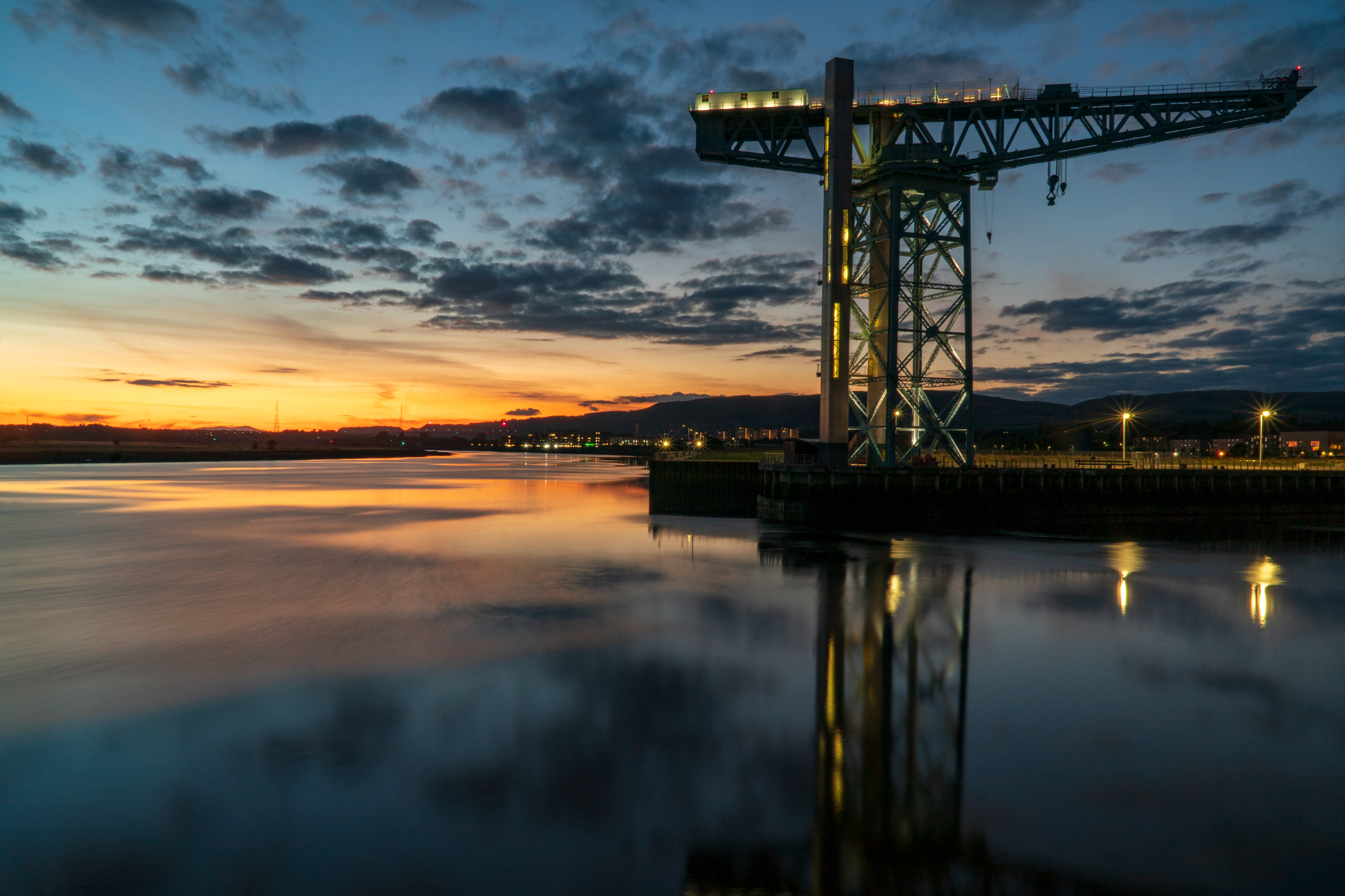 The Titan Crane, Clydebank at sunset with the Erskine Bridge in the distance