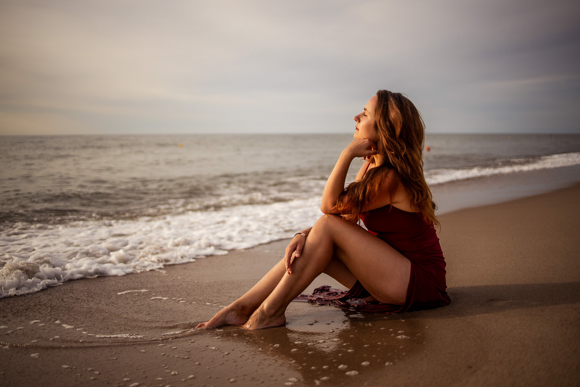 Portrait photography of brown hair women ny the sea captured by Eternal Portraits Photography - East Grinstead