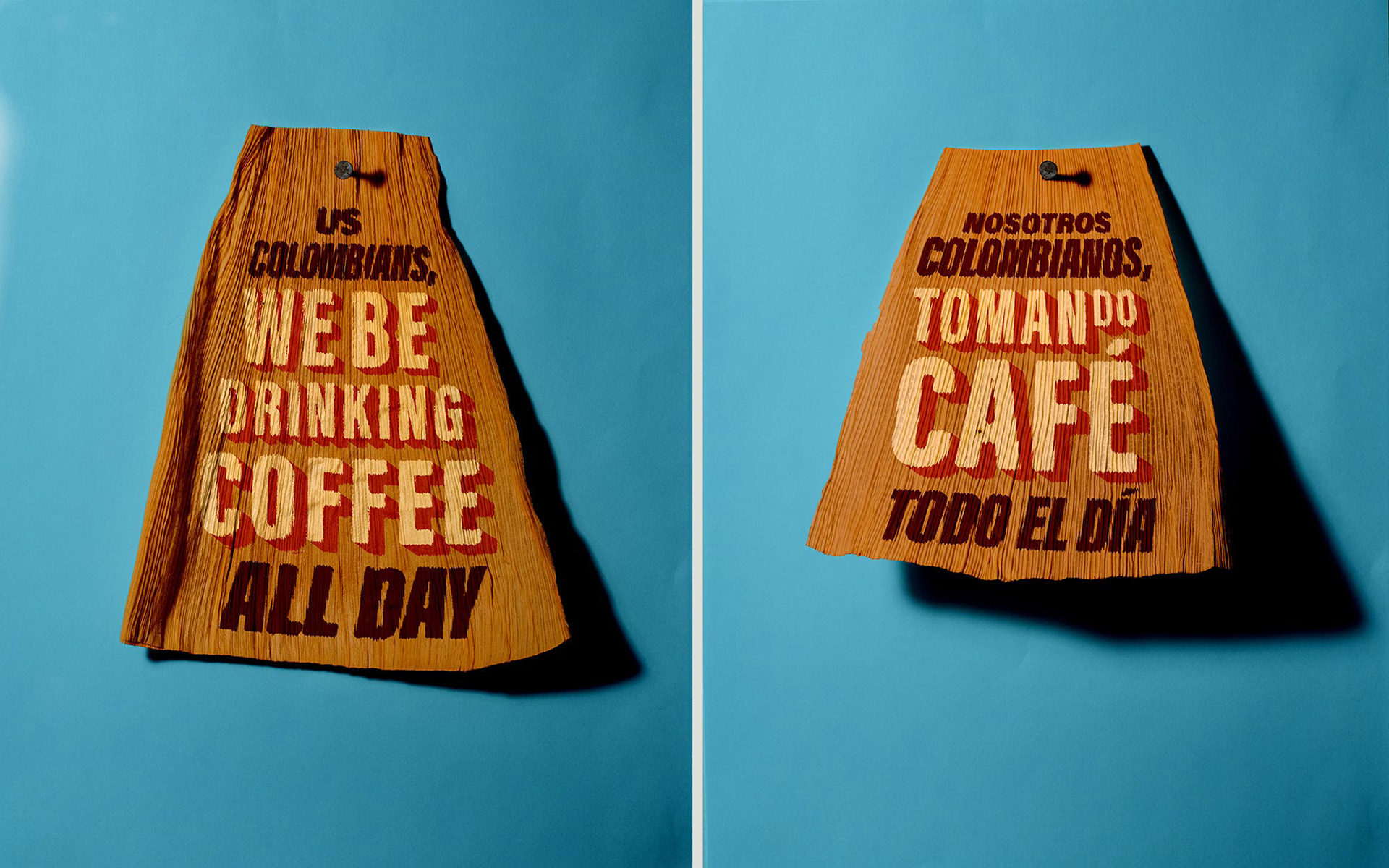 Tamale corn husk that says "Us Colombians, we be drinking coffee all day." Next to it, a second tamale corn husk that says, "Nosostros Colombianos, tomando café todo el día."