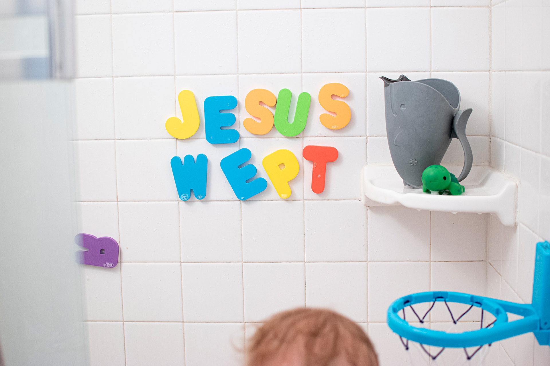 "Jesus Wept" spelled out with bath letters