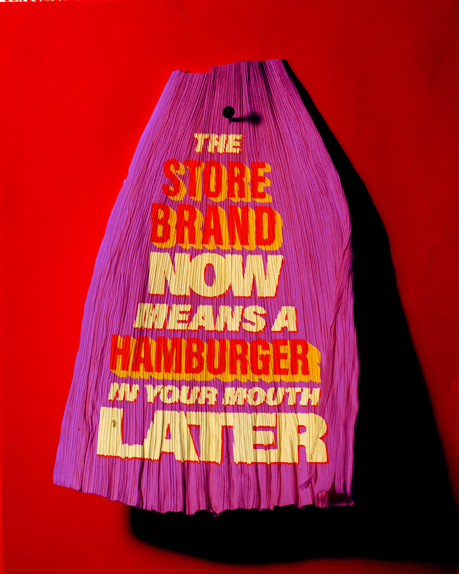 Tamale corn husk that says, "Since Christ is Lord of Heaven and Earth" paired with a tamale corn husk that says "How can I keep from singing?"